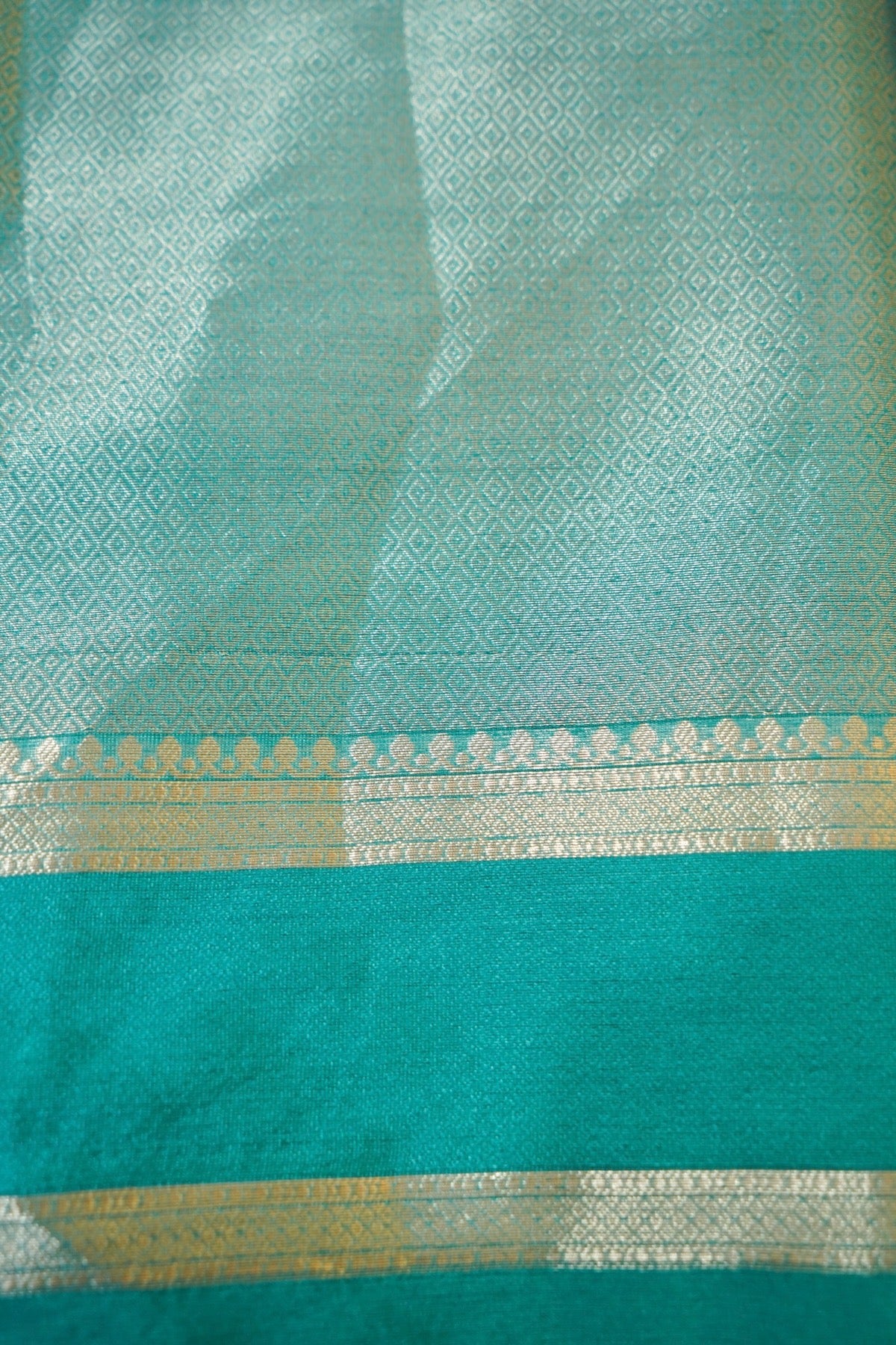 Steel Blue and Turquoise Worm Silk Saree with Gold Zari Detailing