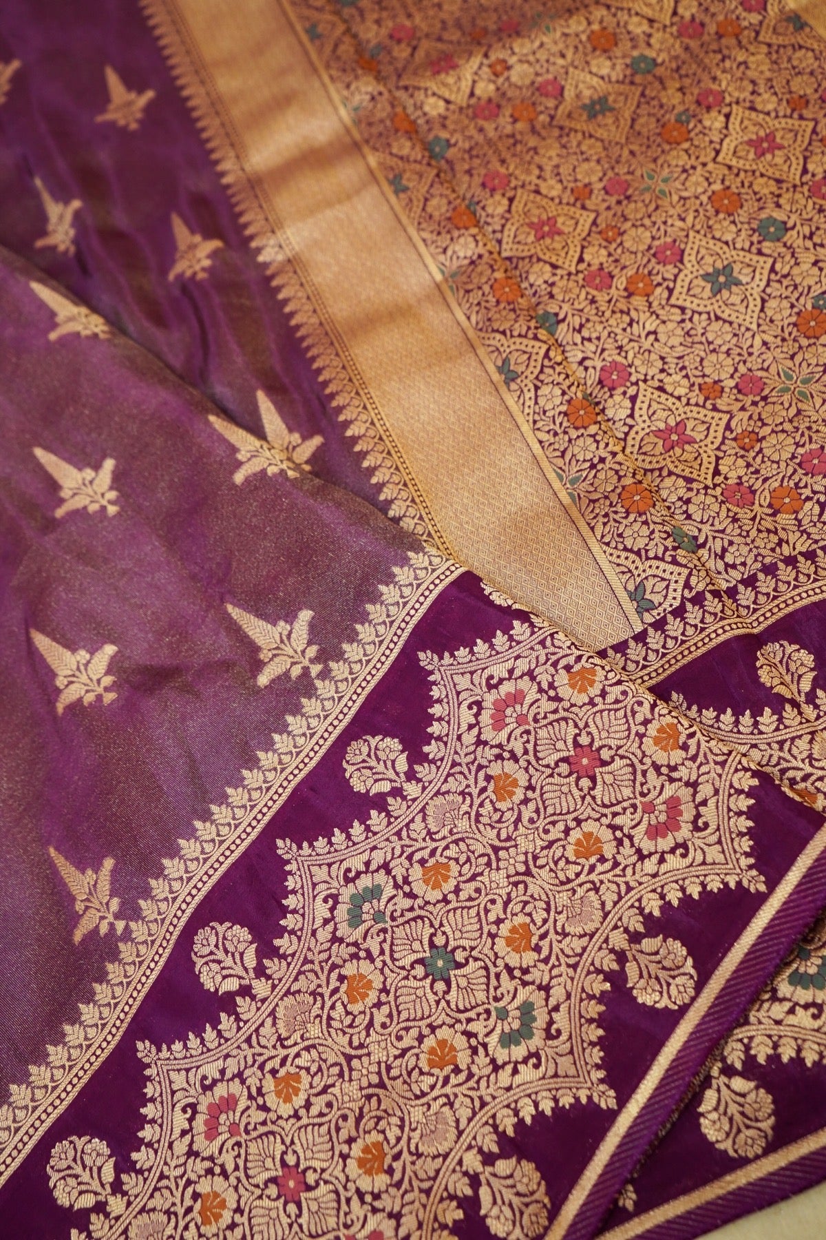 Deep Purple Tissue Silk Saree with Artistic Floral Border