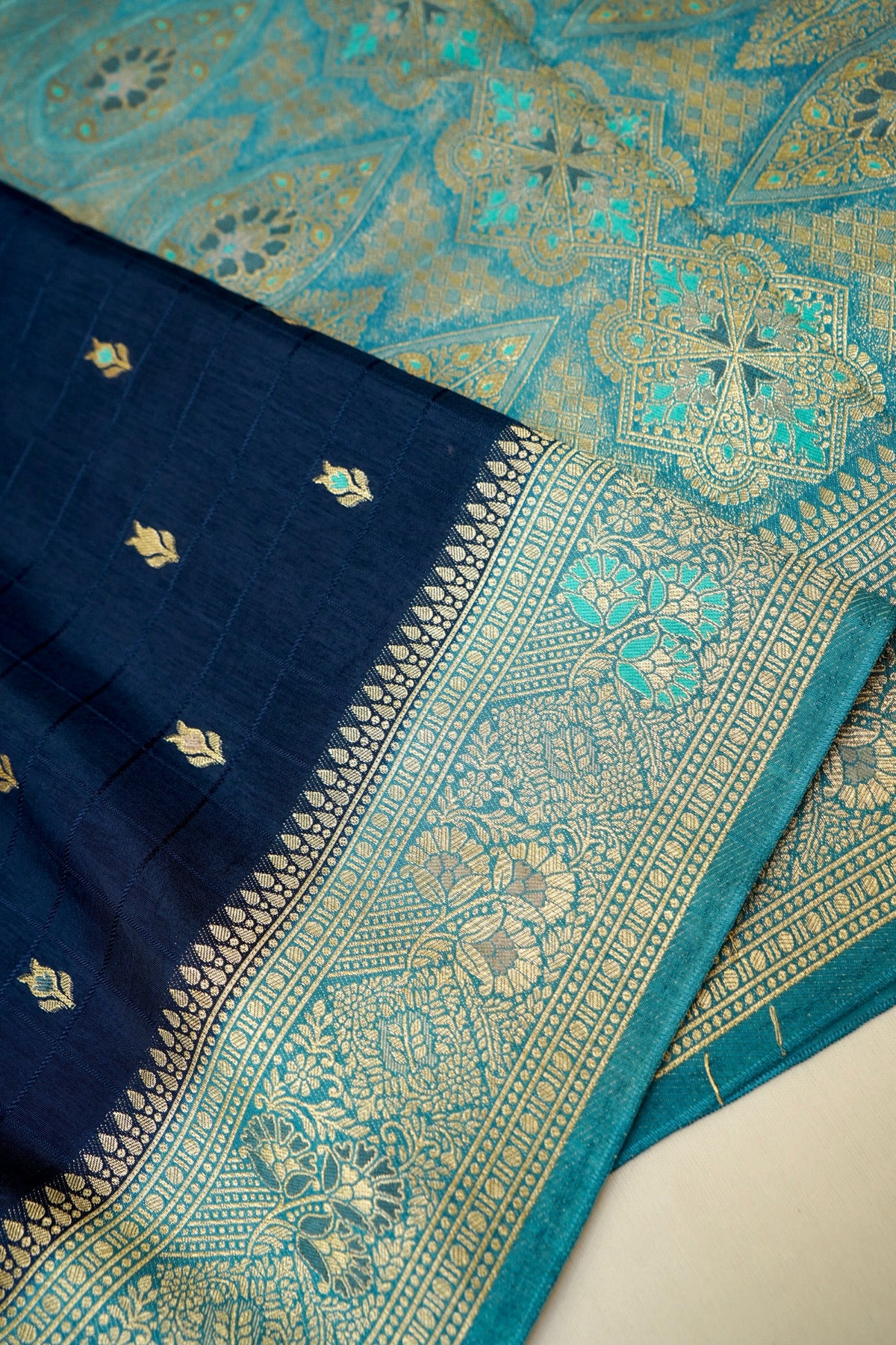 Navy Blue Banarasi Dola Silk Saree with Turquoise Floral Border and Stitched Blouse