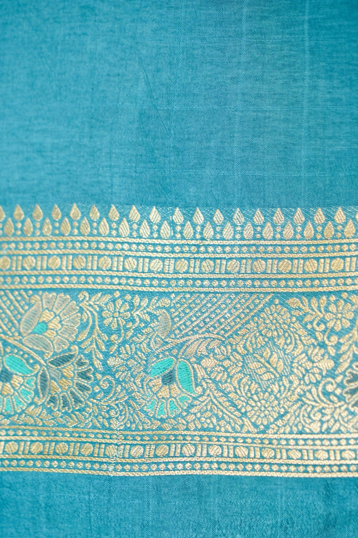 Navy Blue Banarasi Dola Silk Saree with Turquoise Floral Border and Stitched Blouse