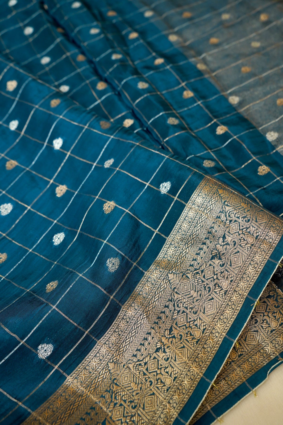 Petrol Blue Checks Pattern Banarasi Dola Silk Saree with Stitched Blouse