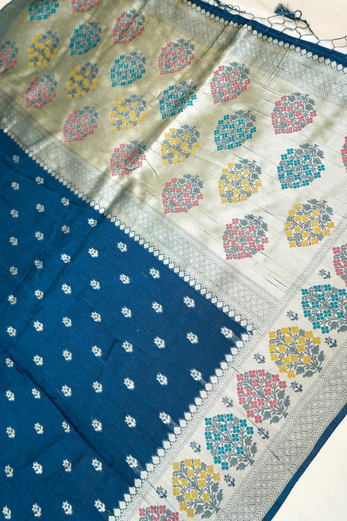 Teal Blue Raw Silk Saree with Multicolor Tree Weave Border