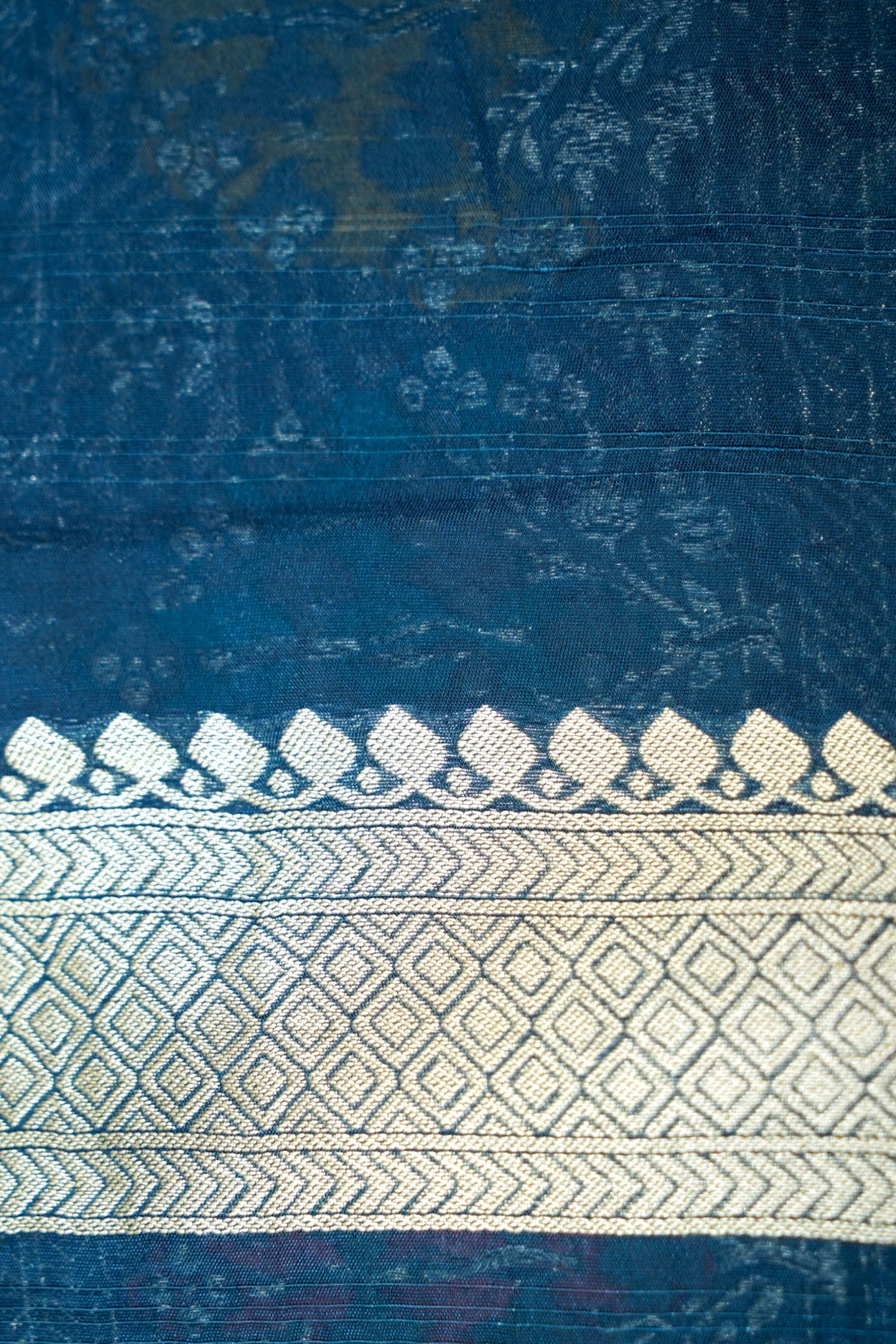 Teal Blue Raw Silk Saree with Multicolor Tree Weave Border