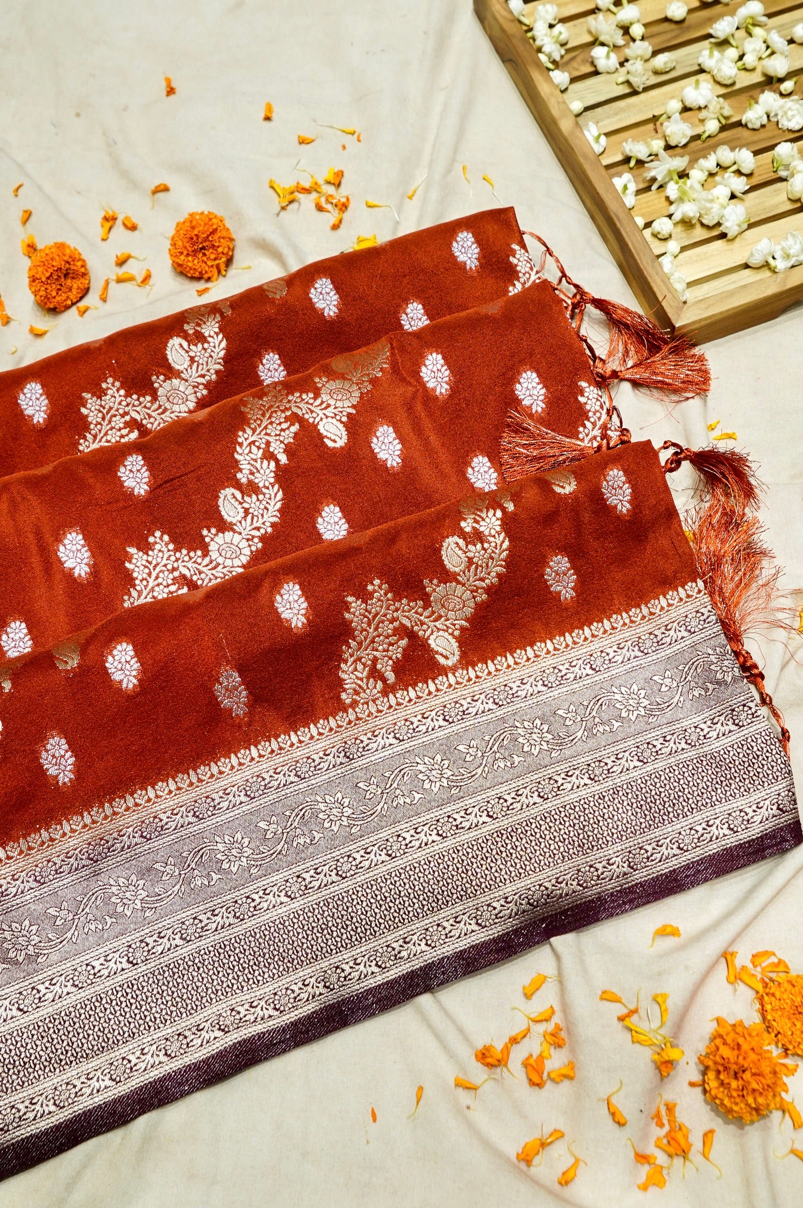 Vibrant Orange Crepe Georgette Silk Saree with Floral Wine Border