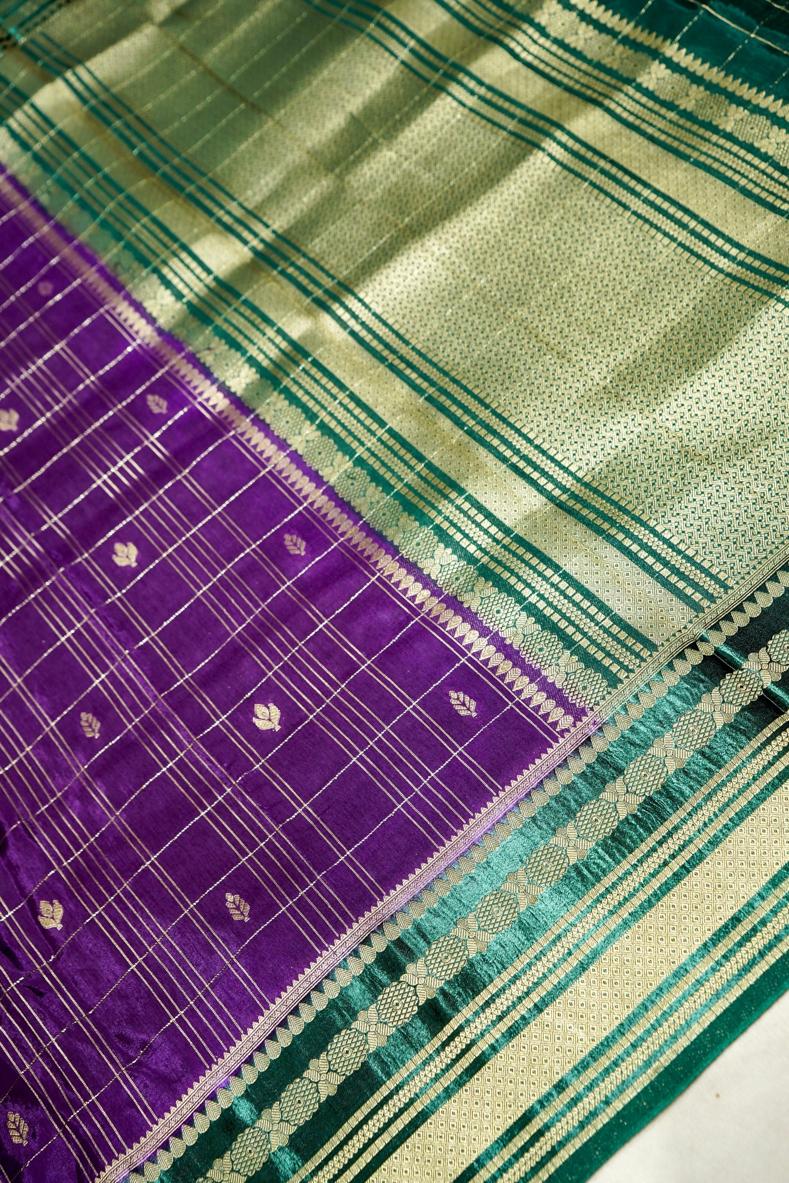 Royal Purple Dola Banarasi Silk Saree with Teal Green and Silver Zari Border