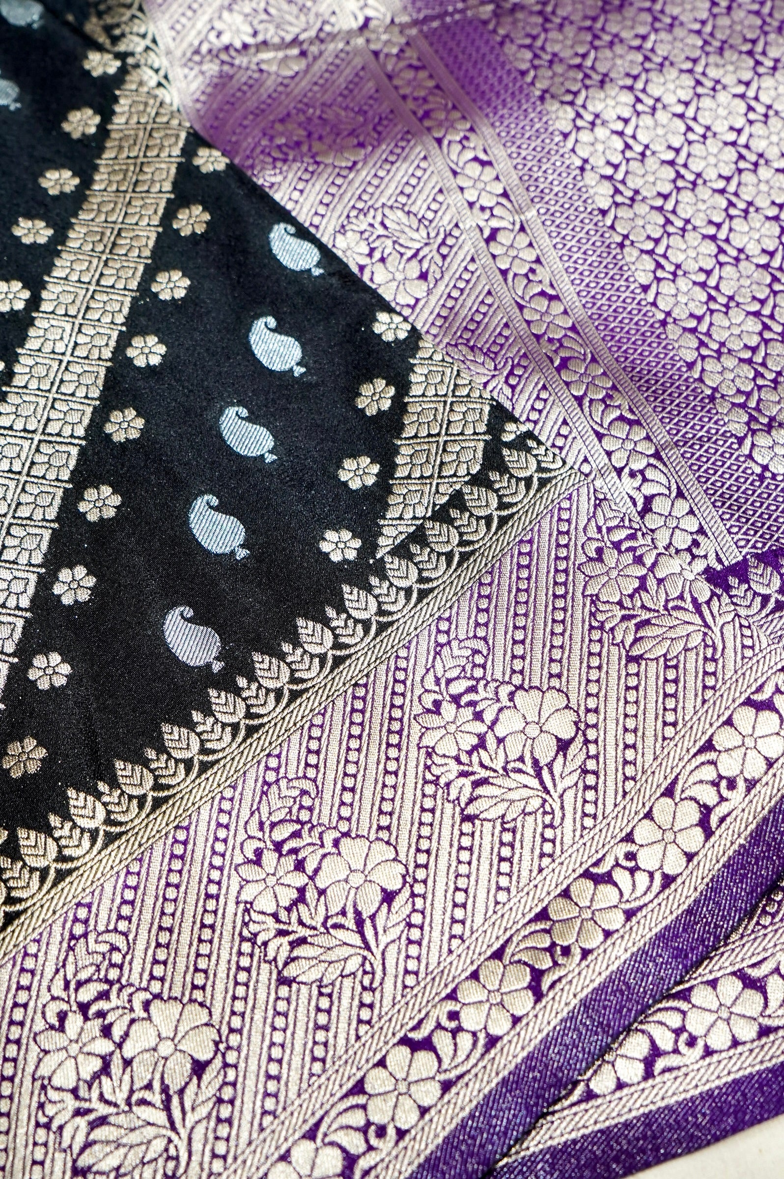 Jet Black Paisley Crepe Georgette Silk Saree with Royal Purple Border