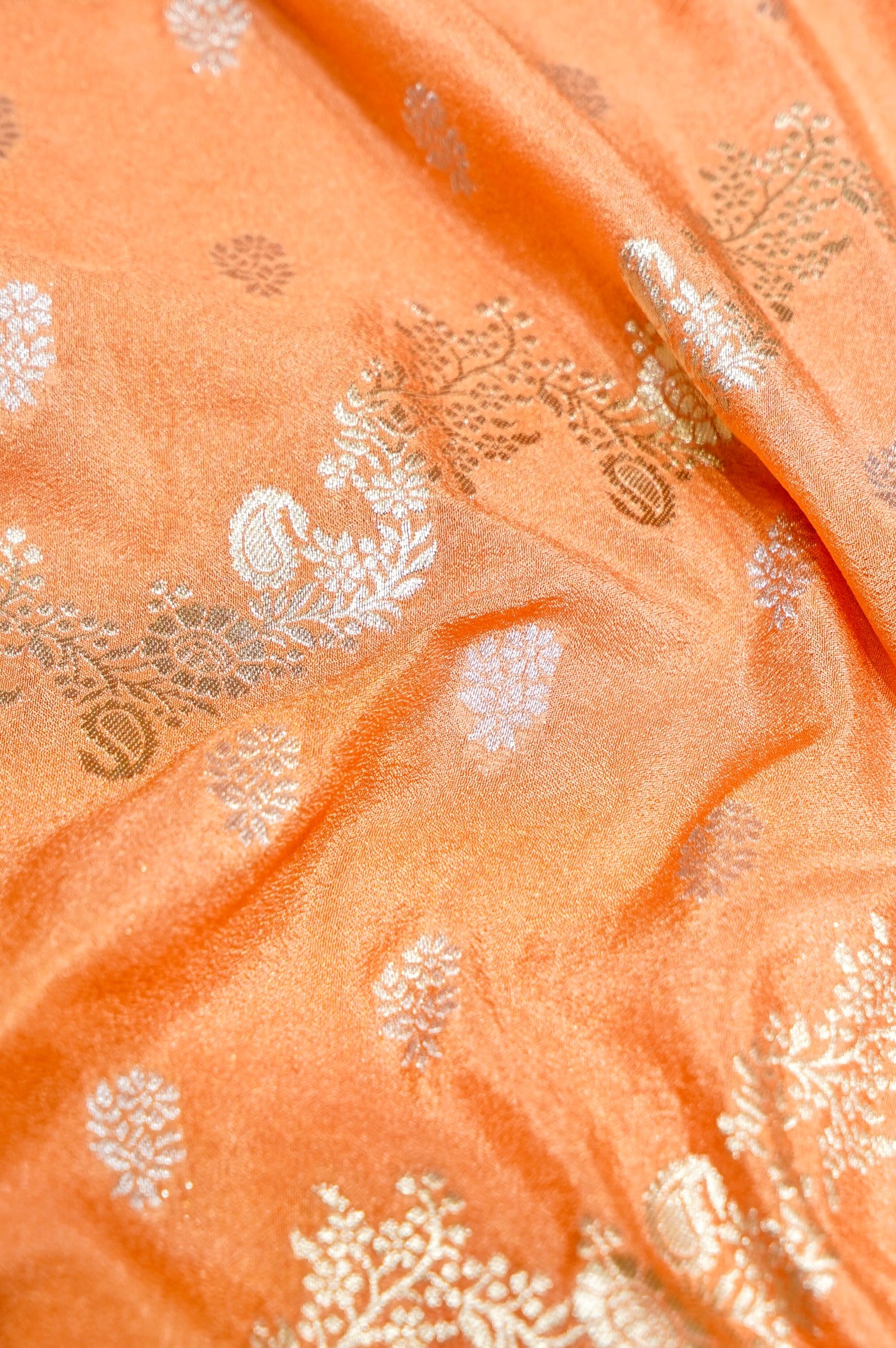 Peach Crepe Georgette Silk Saree with Floral Navy Blue Border