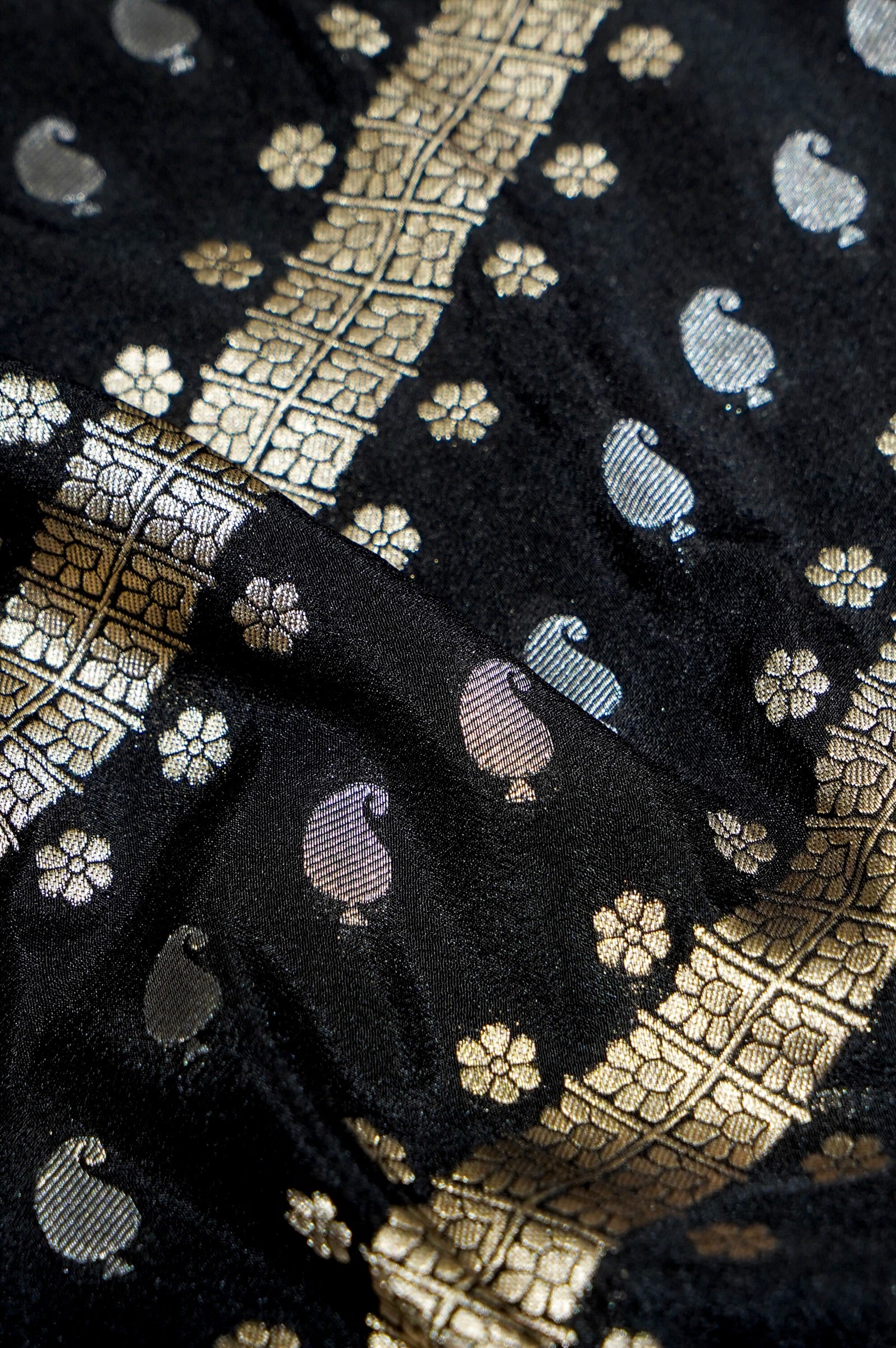 Jet Black Paisley Crepe Georgette Silk Saree with Rani Pink Border
