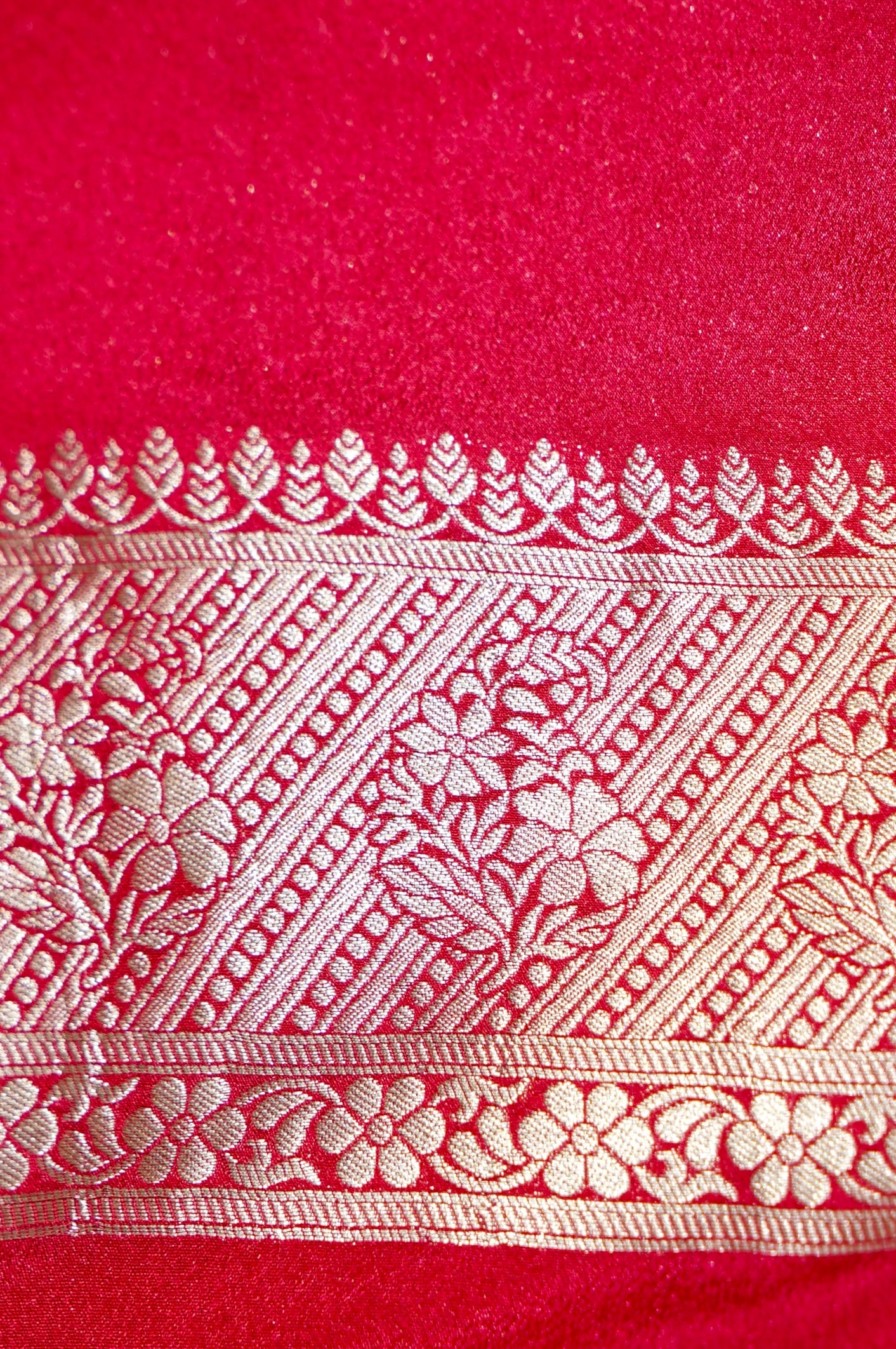 Jet Black Paisley Crepe Georgette Silk Saree with Rani Pink Border
