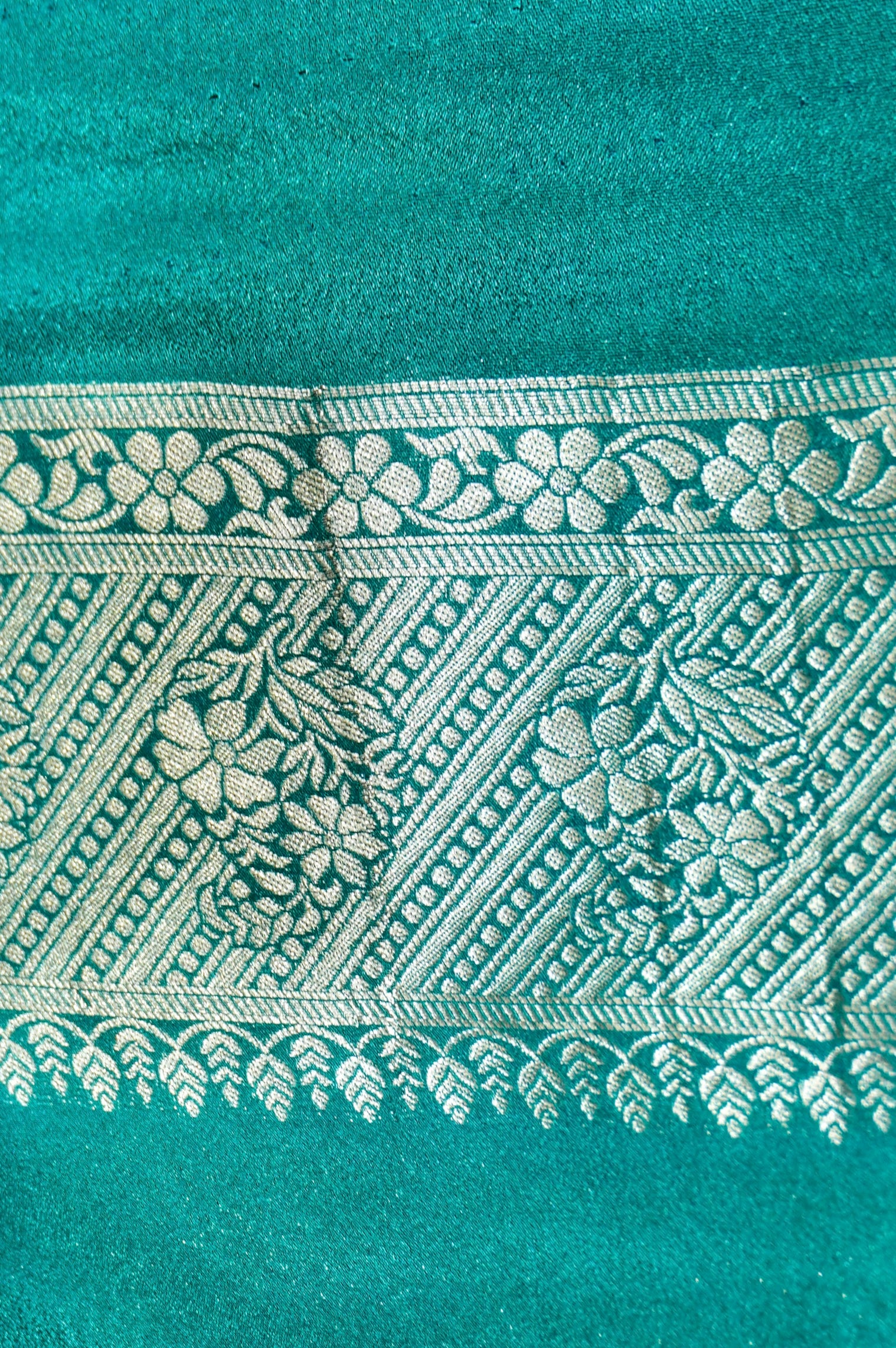 Jet Black Paisley Crepe Georgette Silk Saree with Sea Green Border