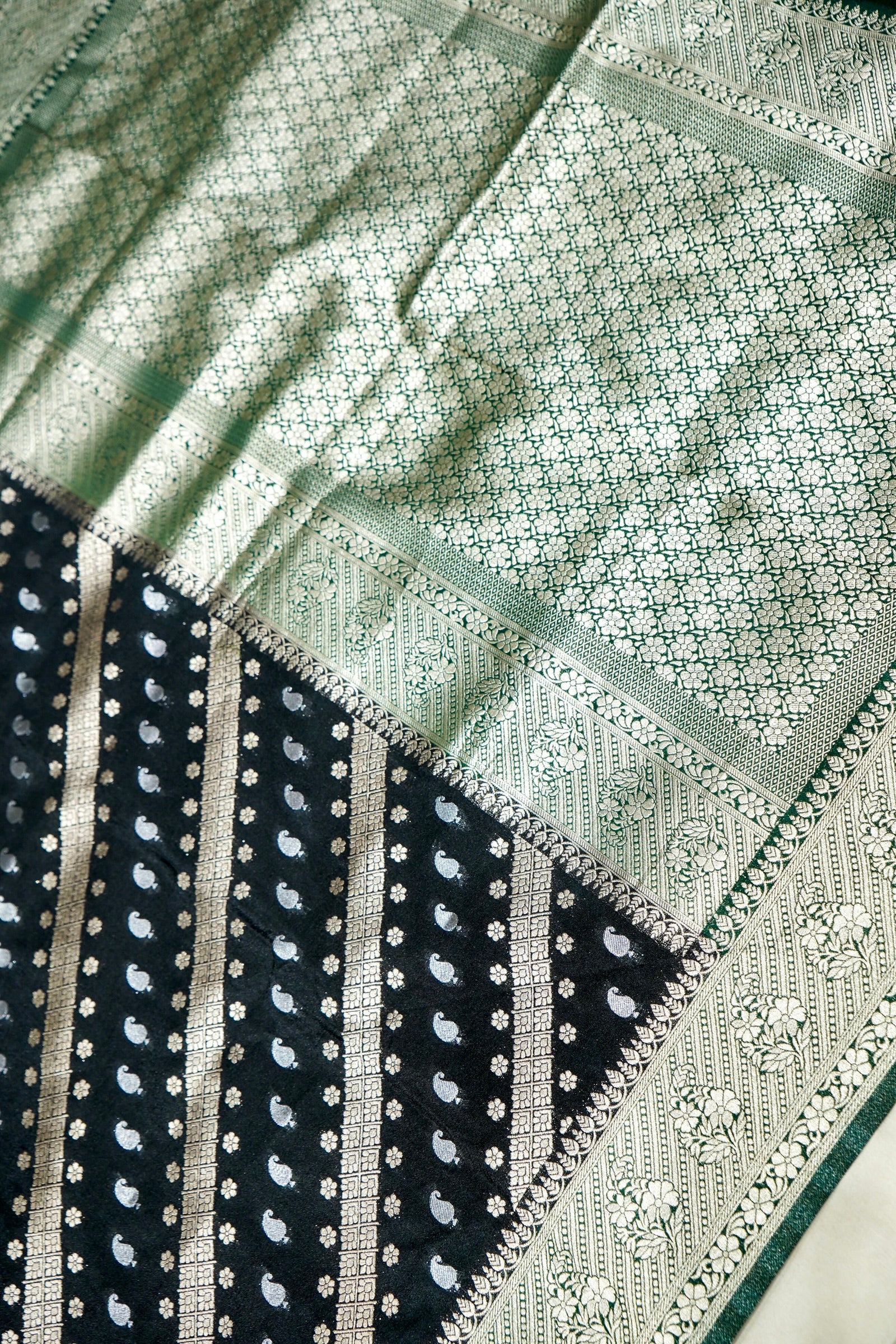 Jet Black Paisley Crepe Georgette Silk Saree with Green Border