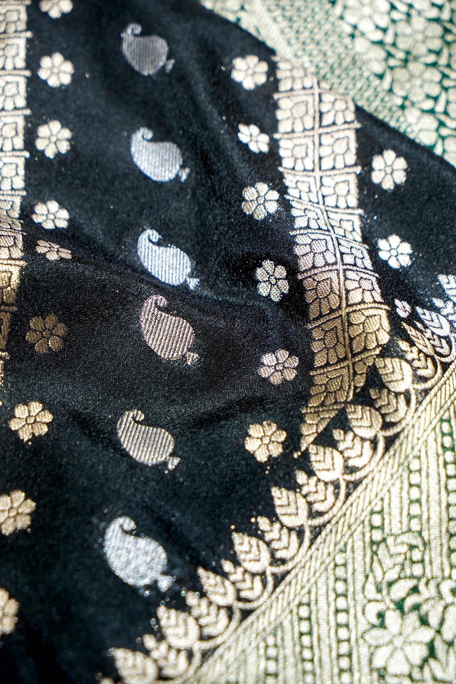 Jet Black Paisley Crepe Georgette Silk Saree with Green Border