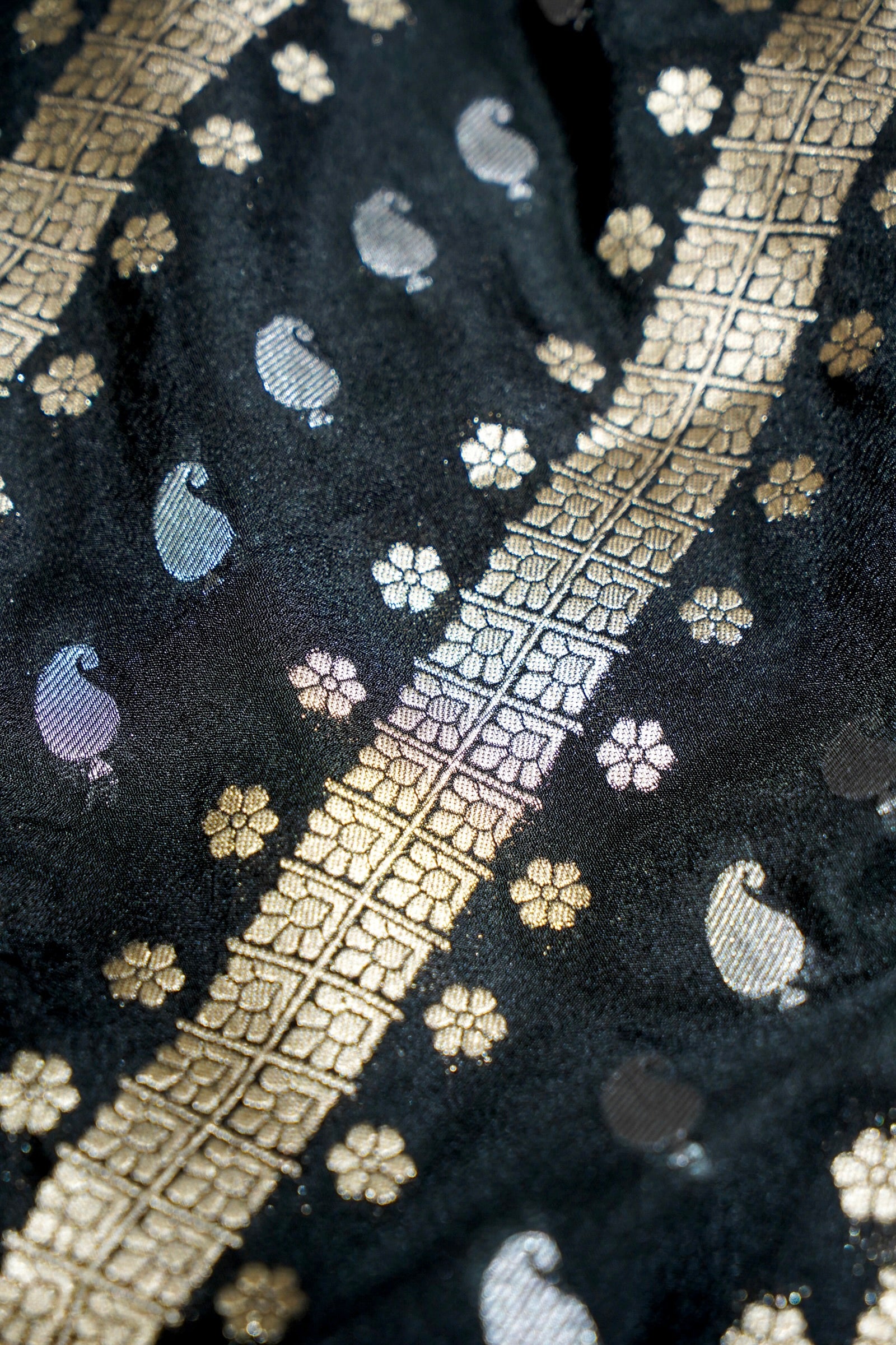 Jet Black Paisley Crepe Georgette Silk Saree with Green Border