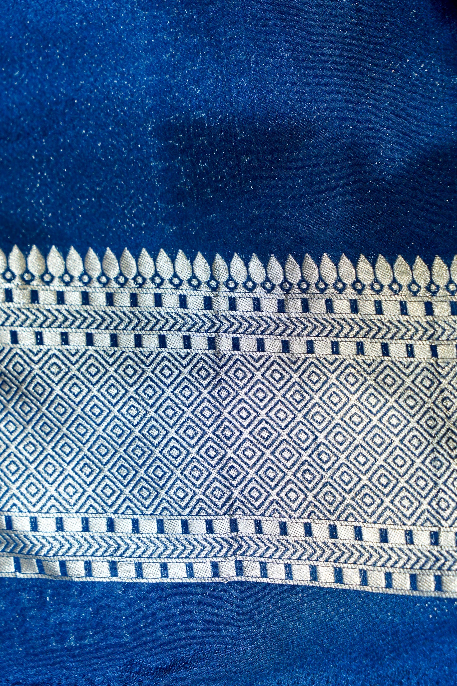 Jet Black Bell Motifs Crepe Georgette Silk Saree with Royal Blue Border