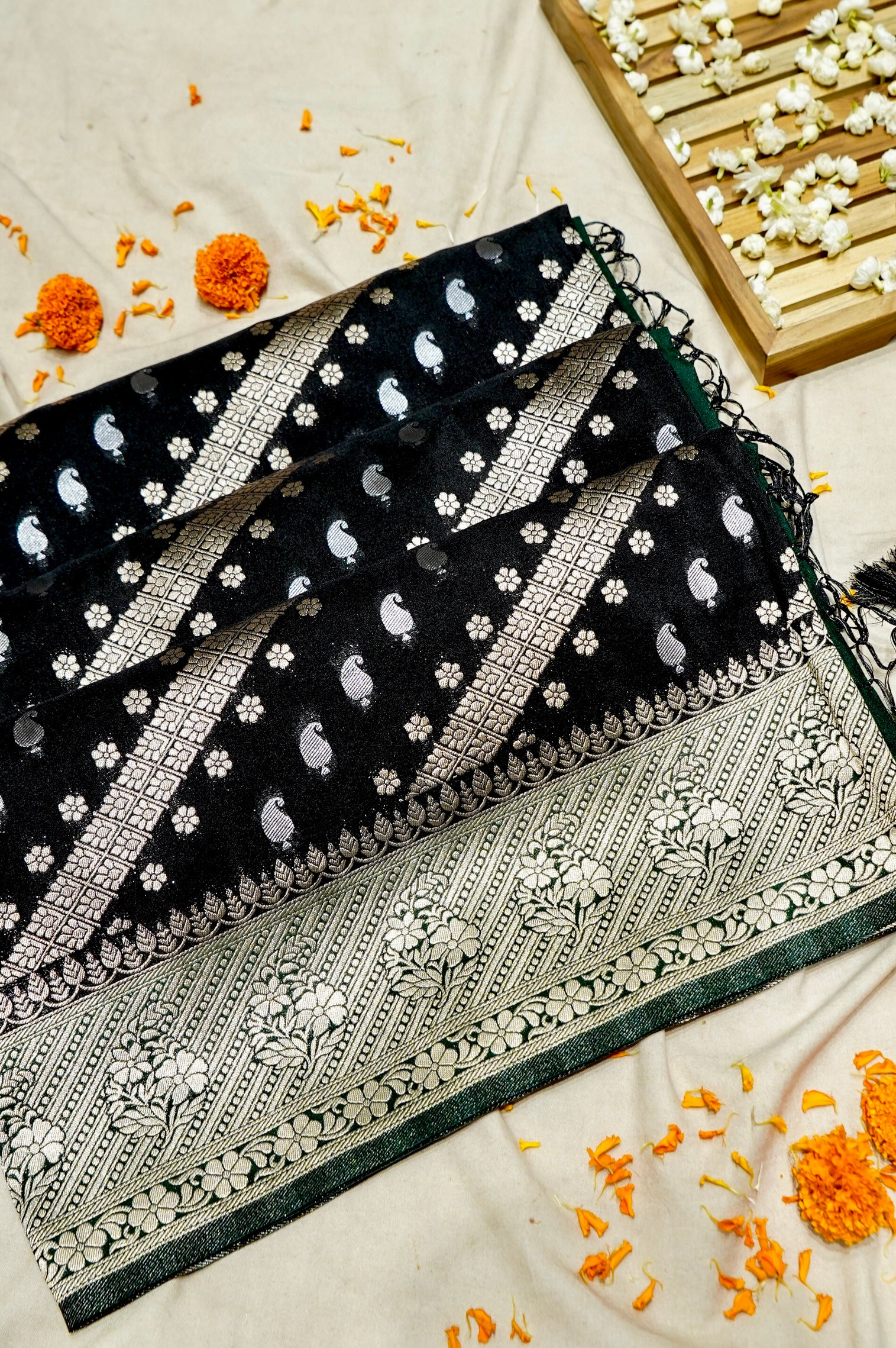 Jet Black Paisley Crepe Georgette Silk Saree with Green Border