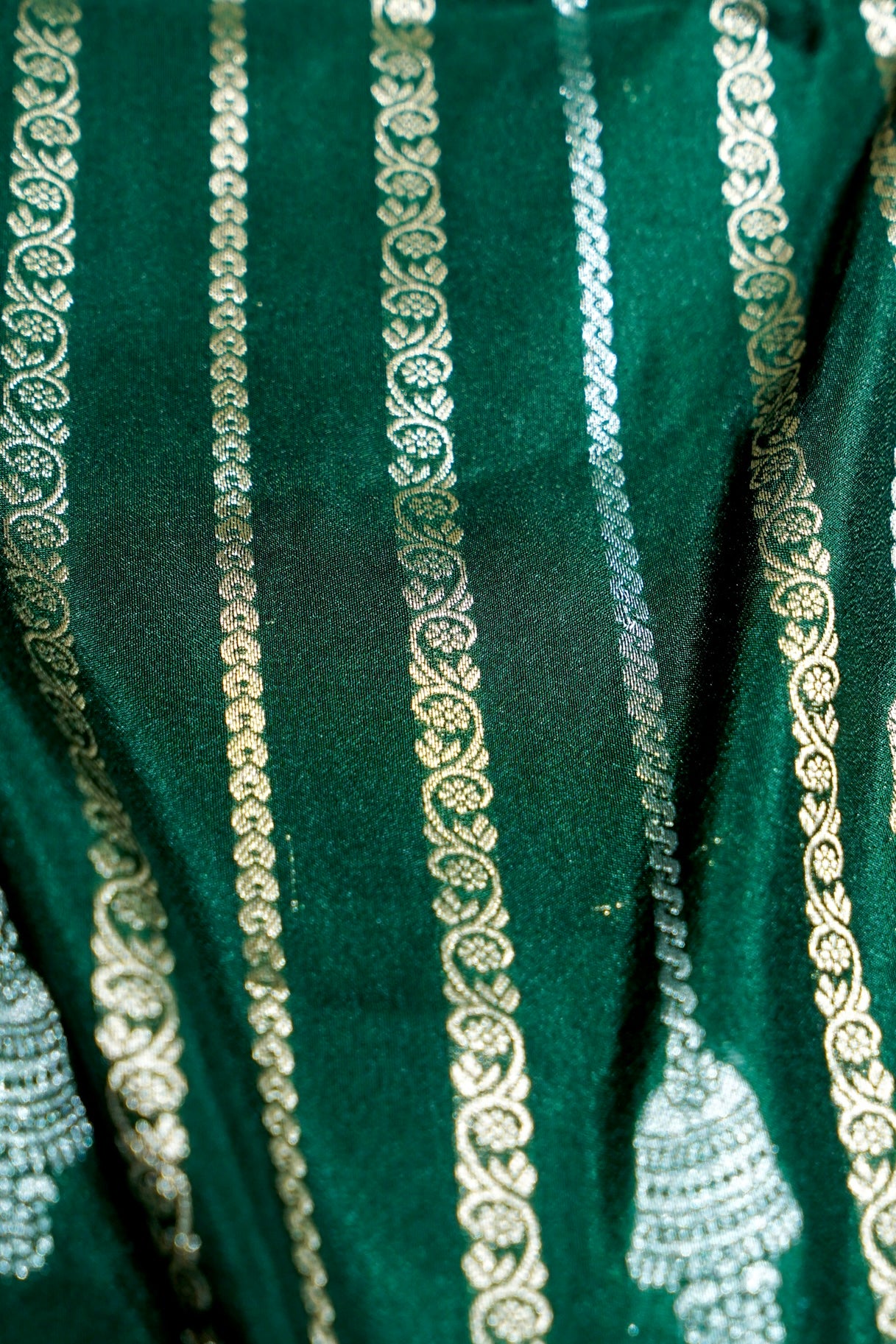 Bottle Green Bell Motifs Crepe Georgette Silk Saree with Red Border
