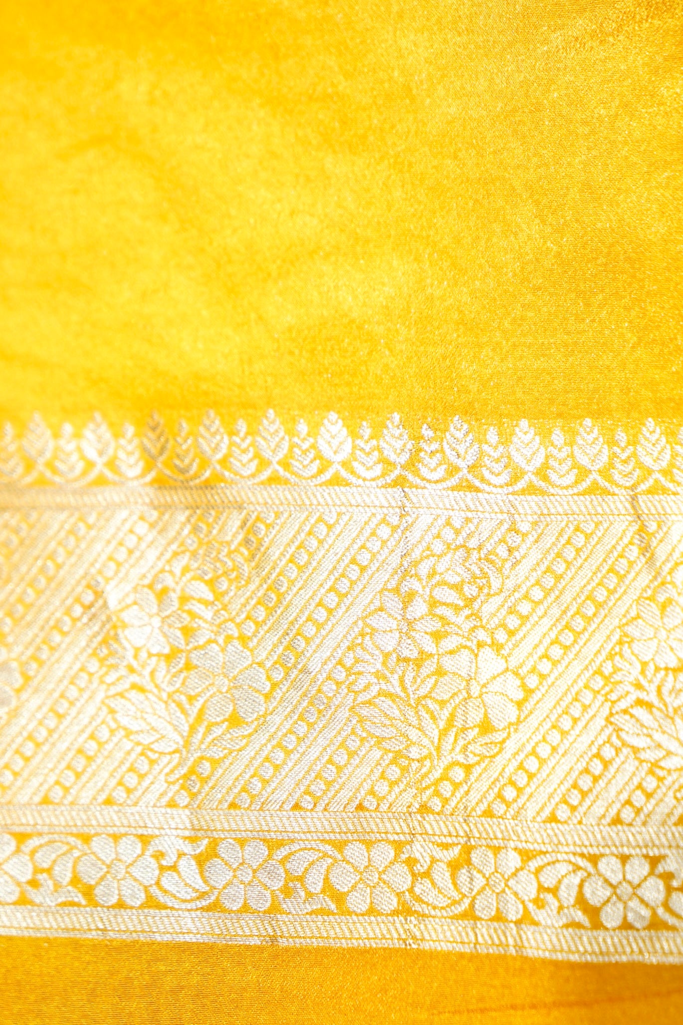 Rust Orange Paisley Crepe Georgette Silk Saree with Golden Yellow Border