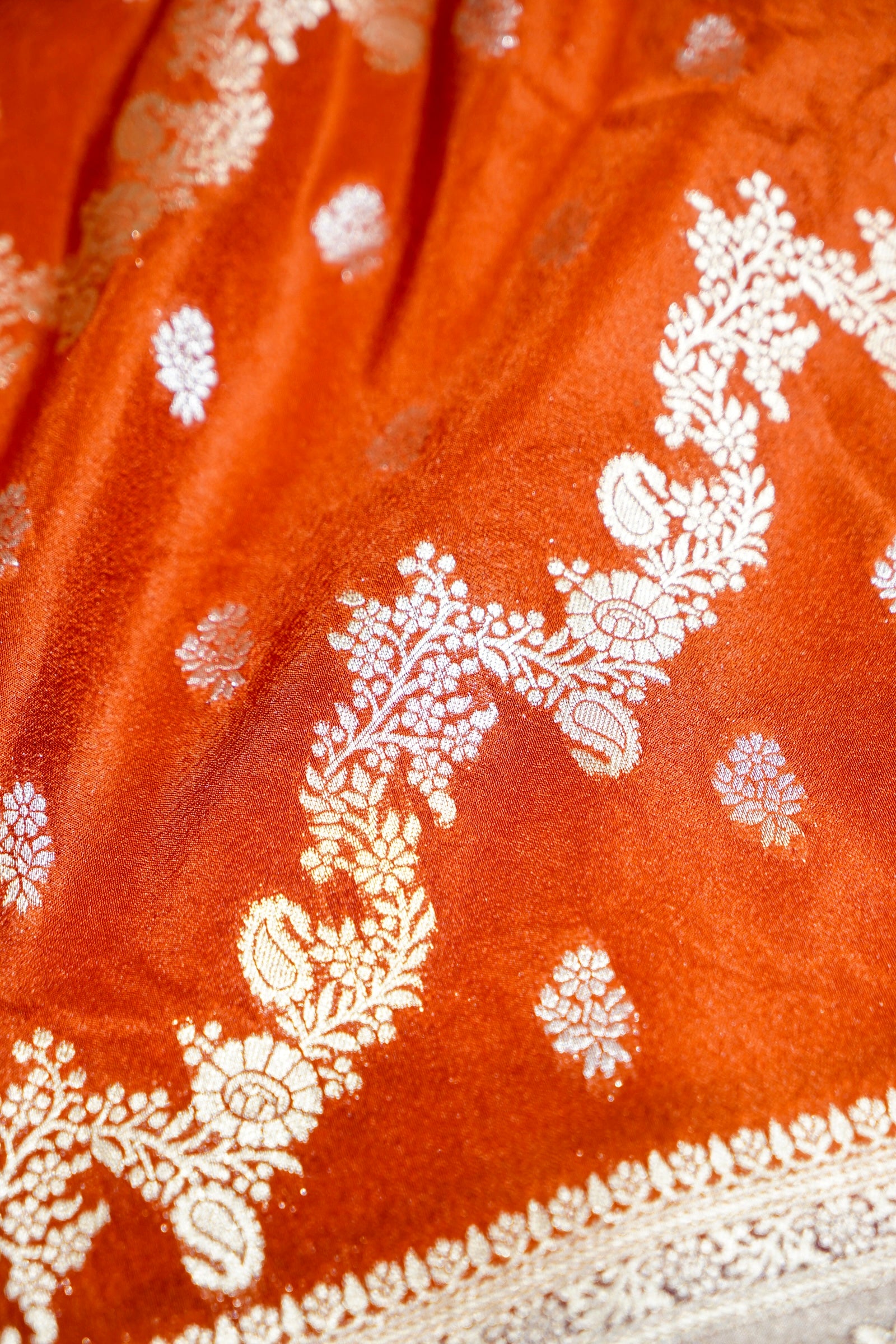 Vibrant Orange Crepe Georgette Silk Saree with Floral Wine Border