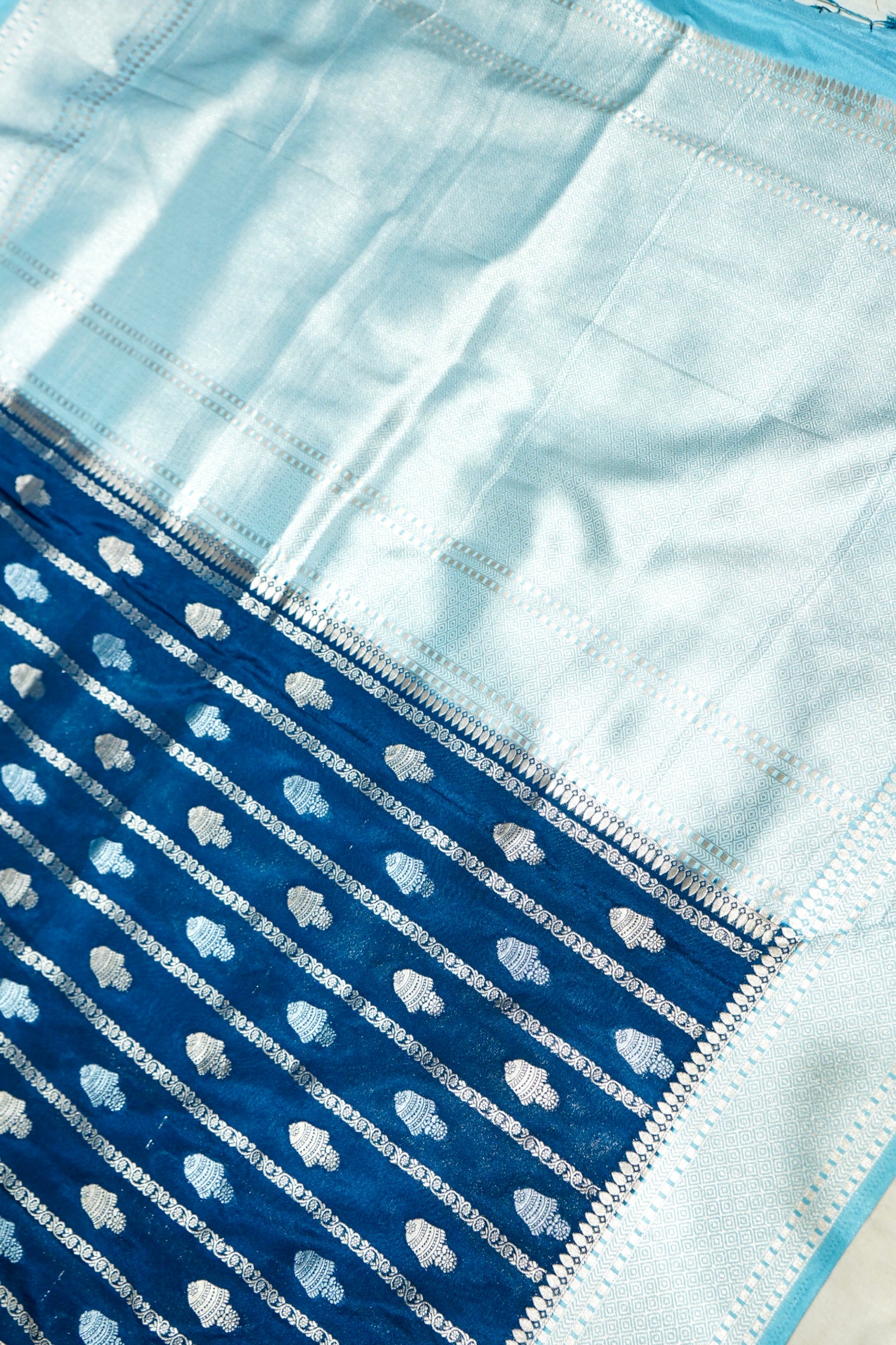 Navy Blue Bell Motifs Crepe Georgette Silk Saree with Ice Blue Border