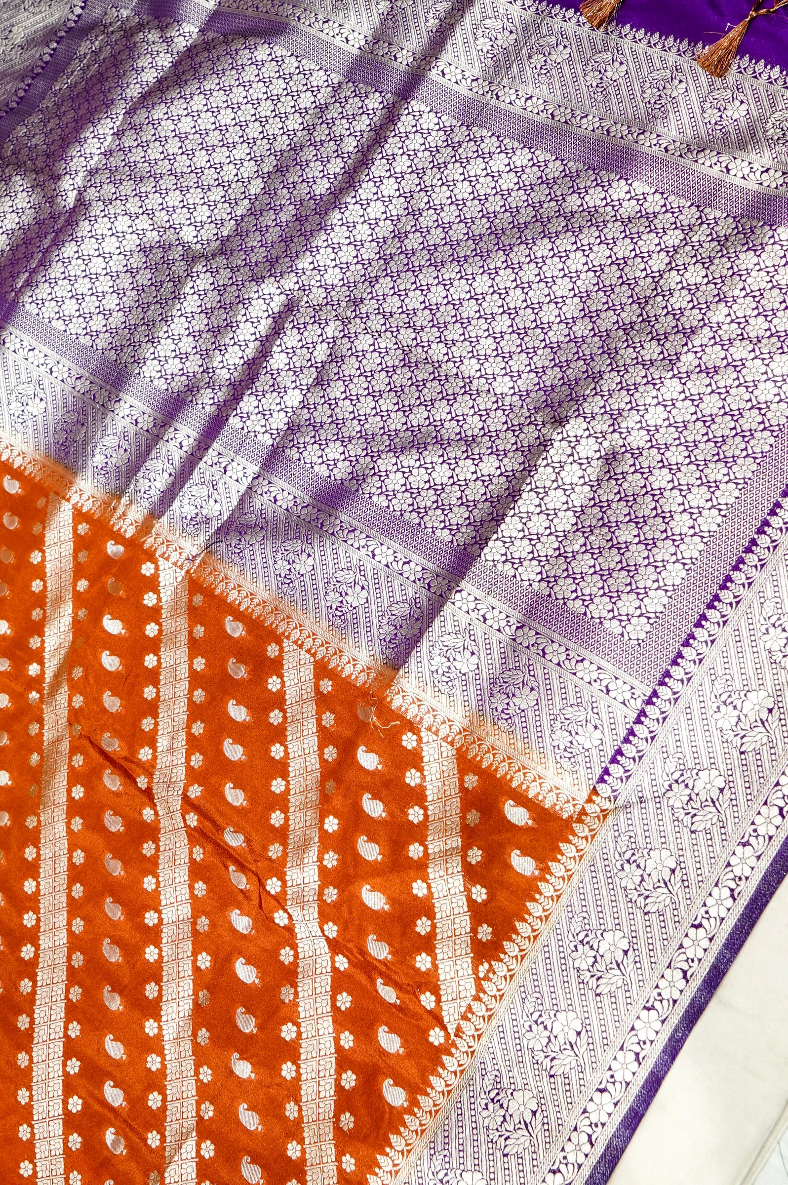Rust Orange Paisley Crepe Georgette Silk Saree with Royal Purple Border