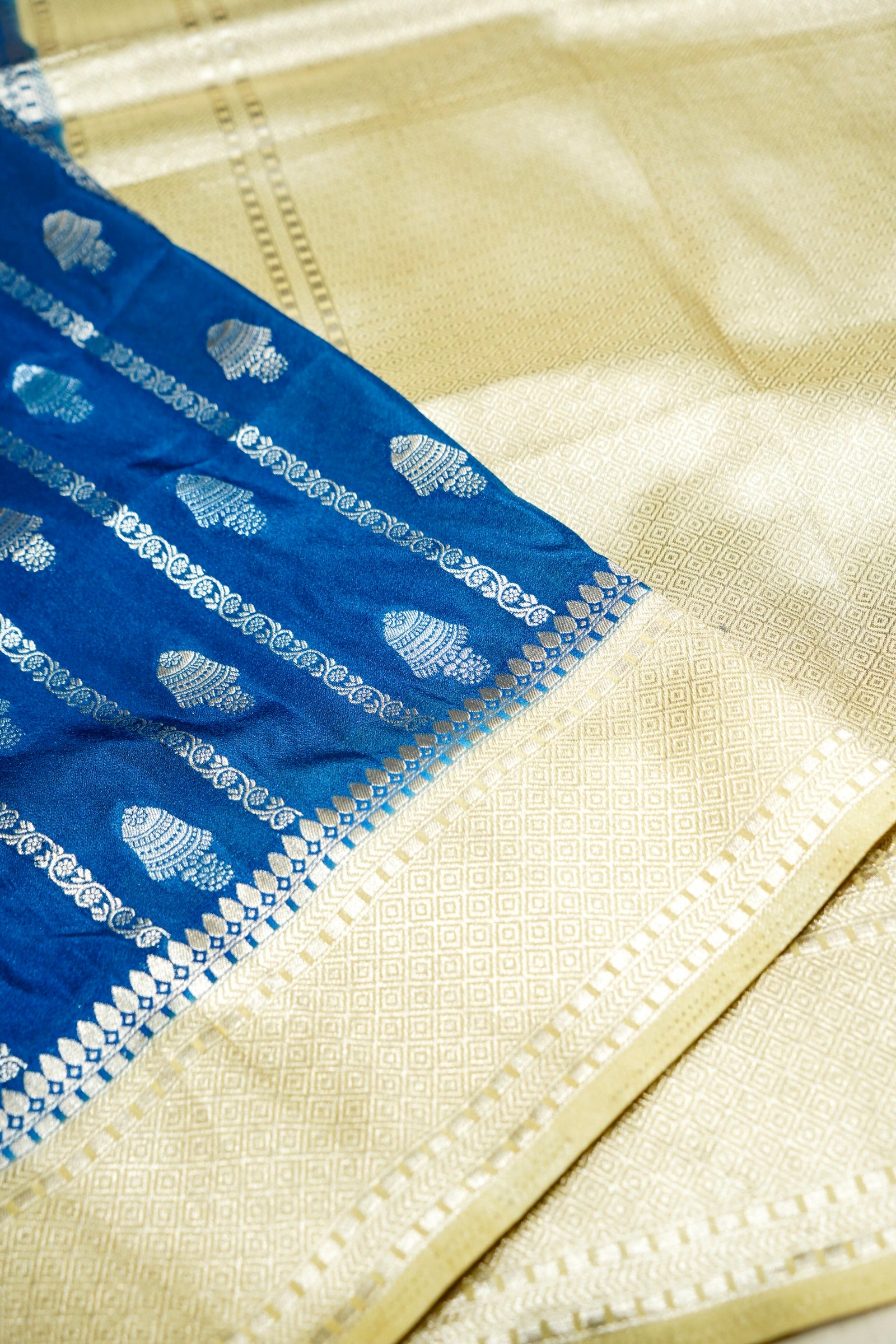 Royal Blue Bell Motifs Crepe Georgette Silk Saree with Champagne Border