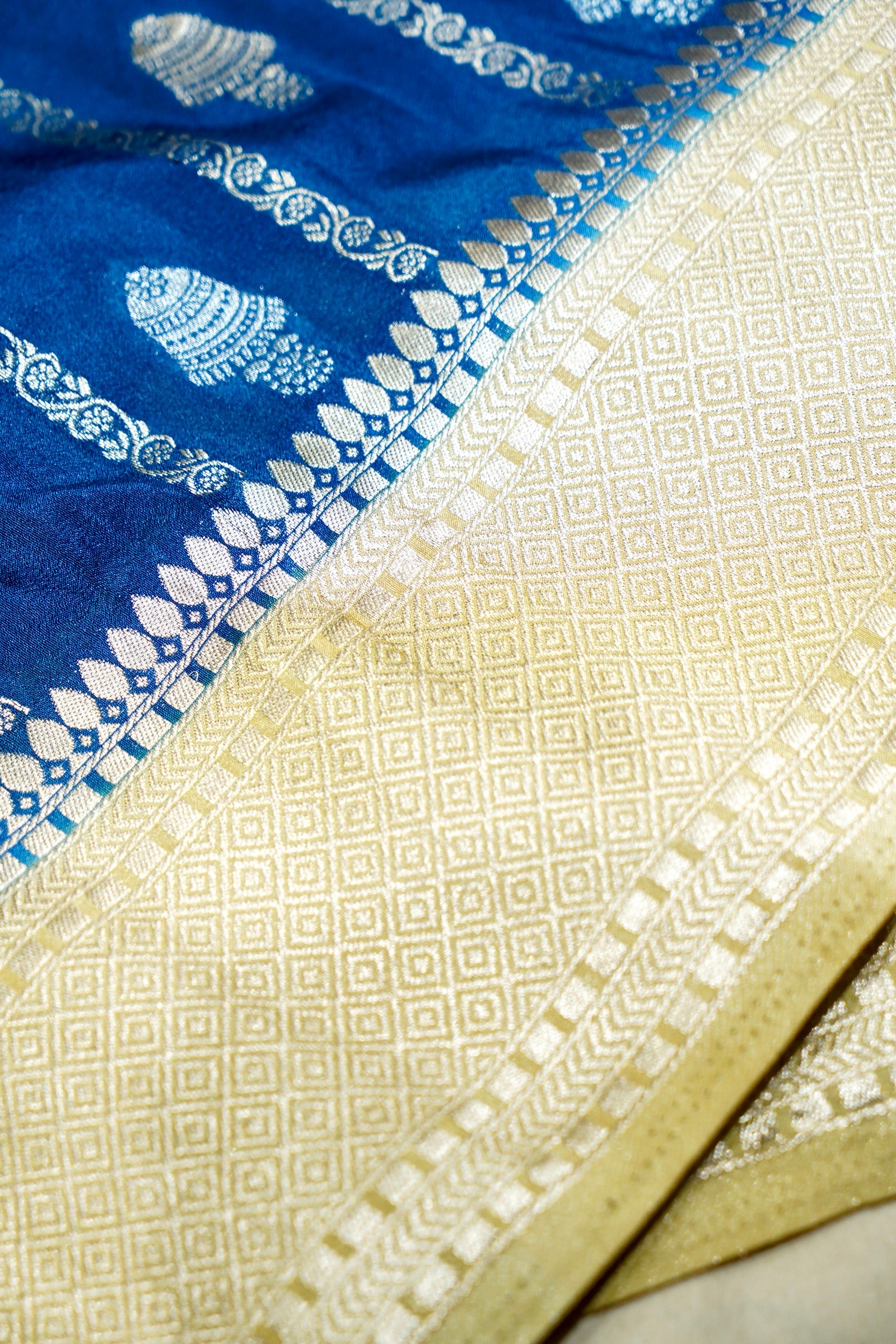 Royal Blue Bell Motifs Crepe Georgette Silk Saree with Champagne Border