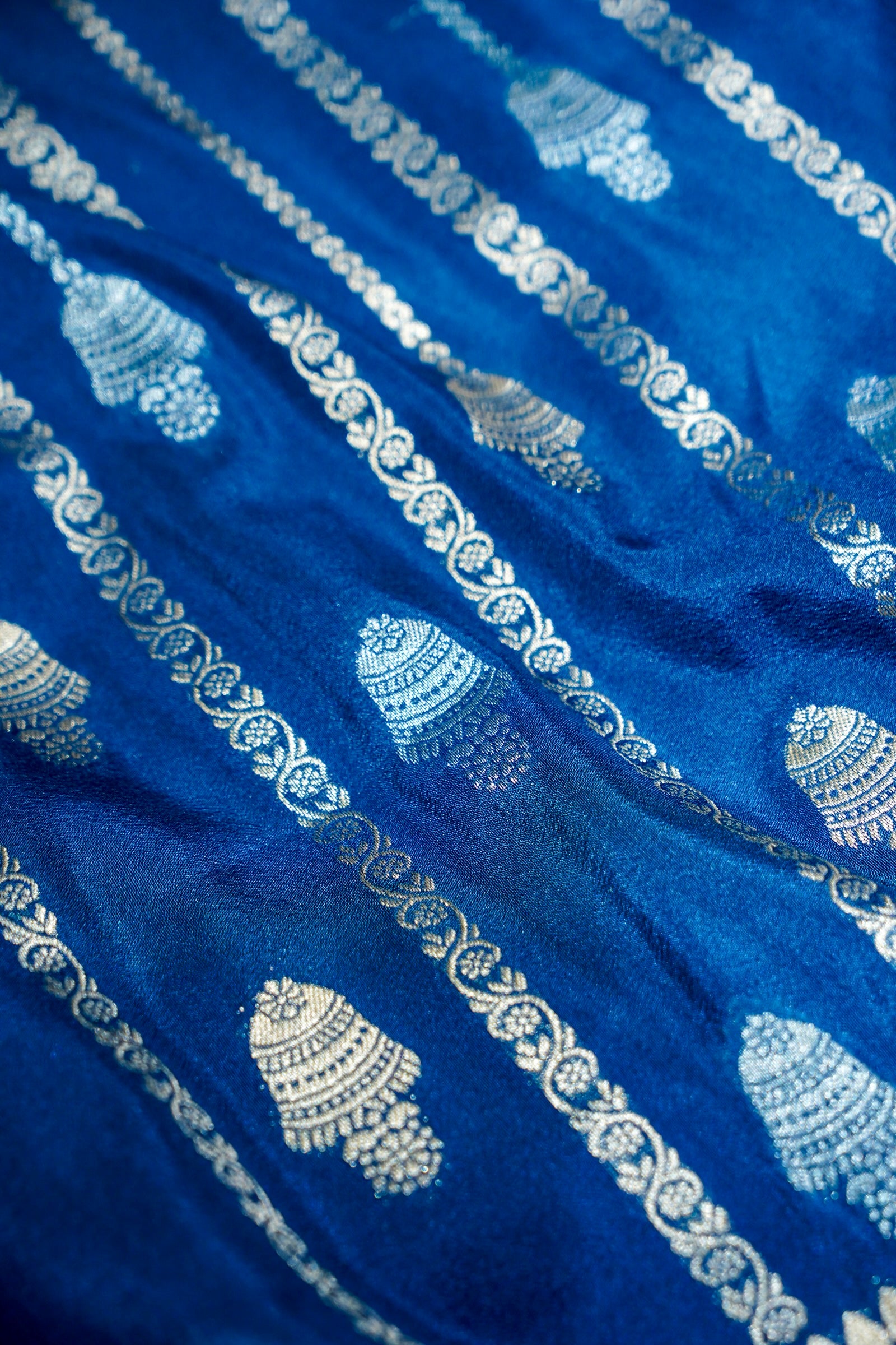 Royal Blue Bell Motifs Crepe Georgette Silk Saree with Champagne Border