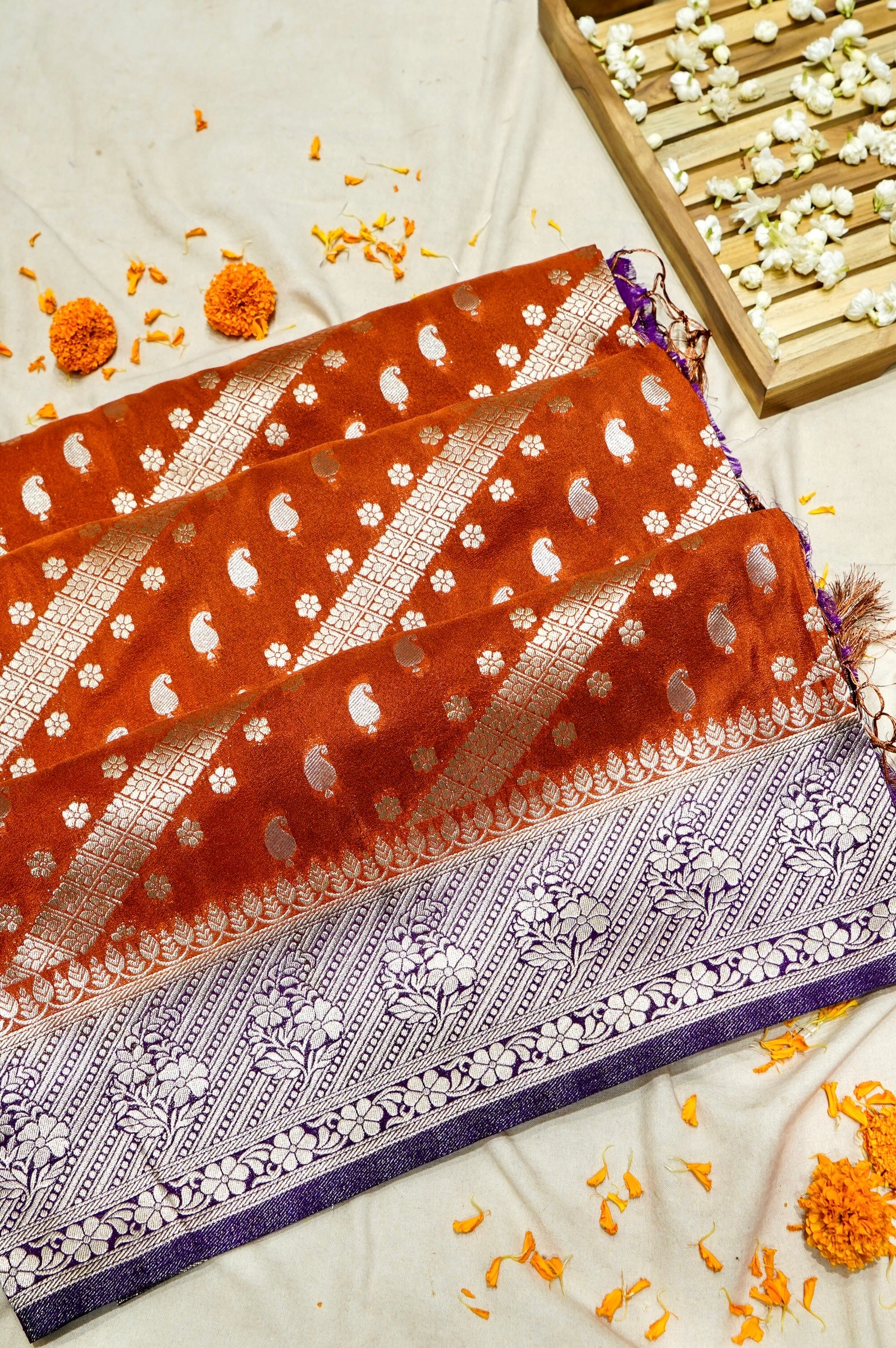 Rust Orange Paisley Crepe Georgette Silk Saree with Royal Purple Border