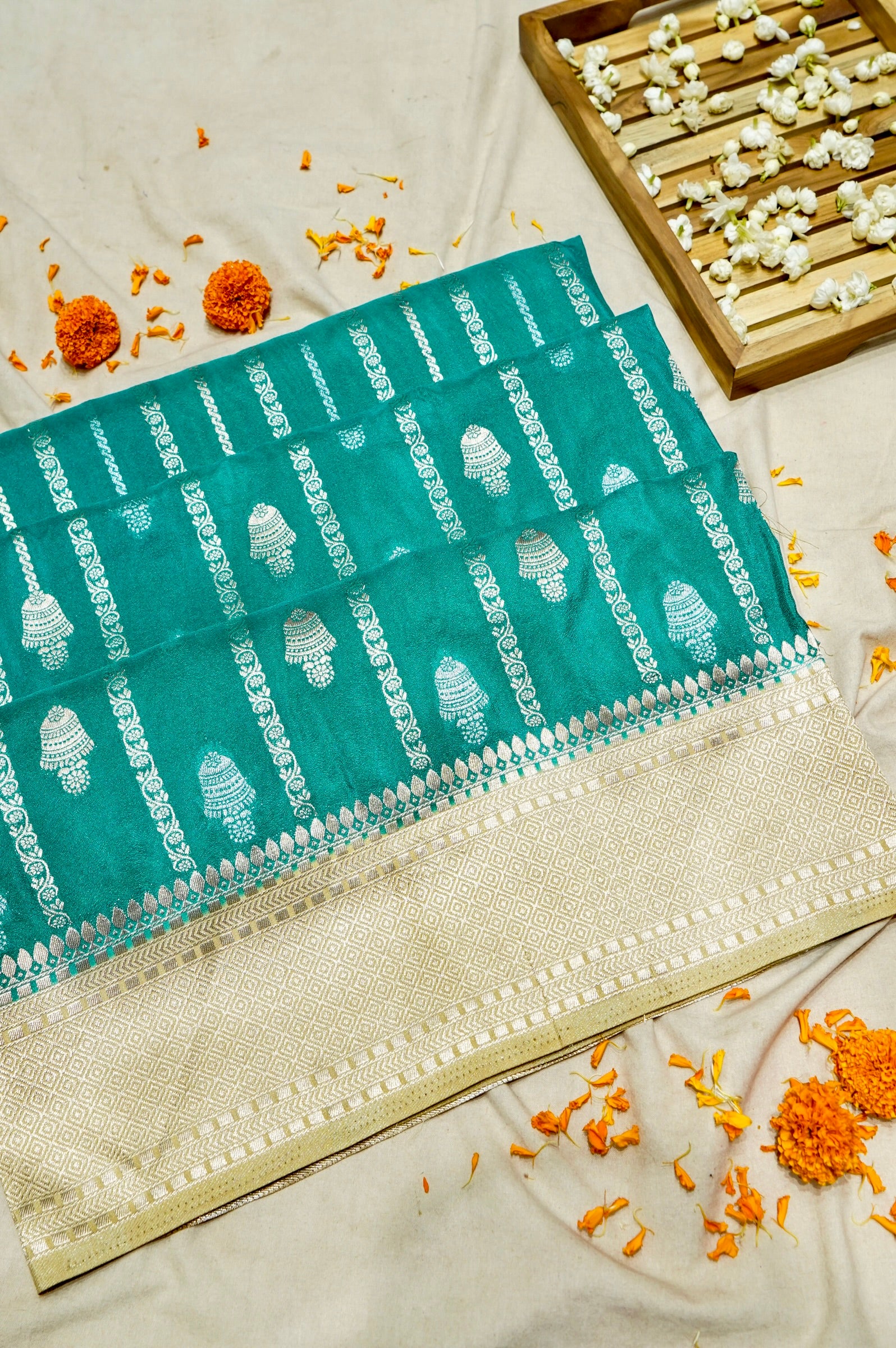 Aqua Green Bell Motifs Crepe Georgette Silk Saree with Champagne Border