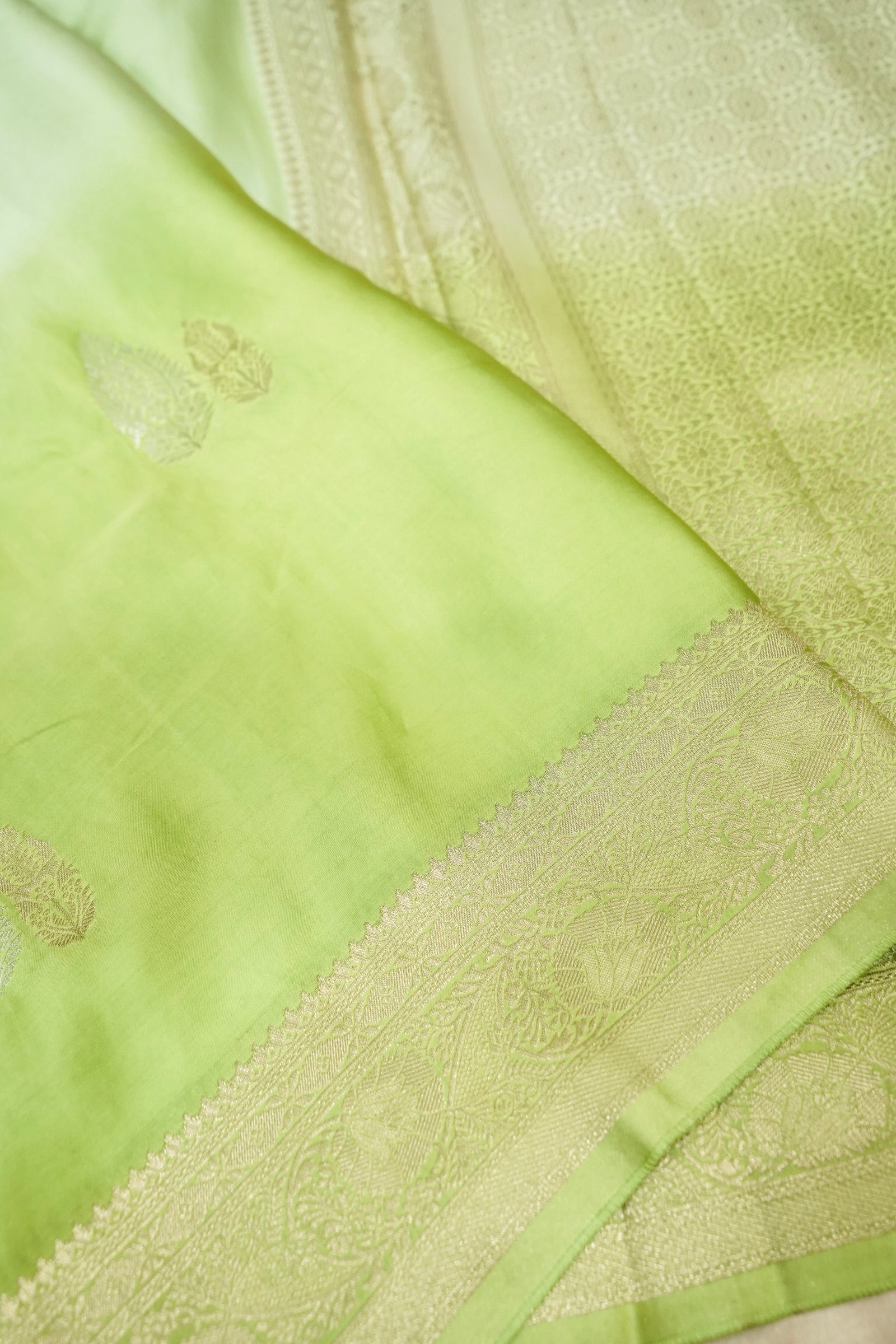 Pastel Pistachio Green Mashru Silk Saree with Gold Zari Border