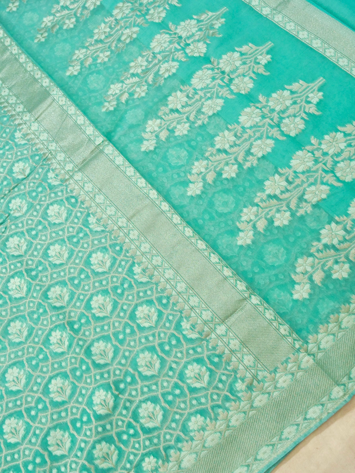 Aqua Blue Jamdhani-Style Saree with Intricate Floral Motifs