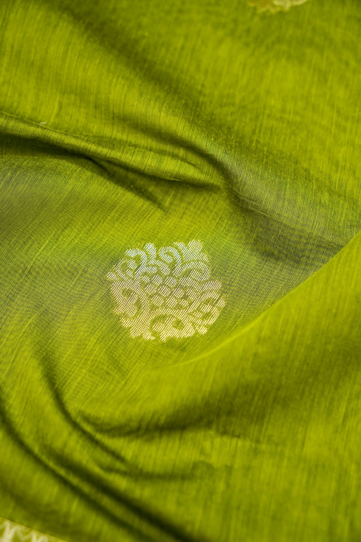 Suvarna - Olive Green Maheshwari Silk Saree with Antique Gold Border