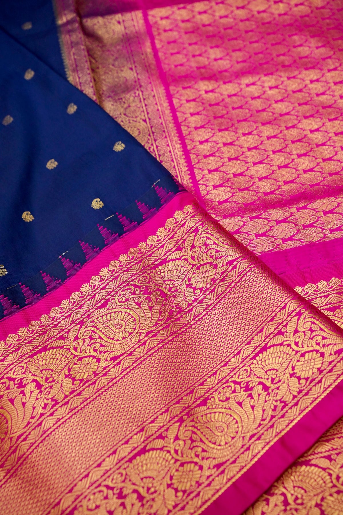 Suvarna - Navy Blue Gadwal Silk Saree with Rani Pink Gold Border