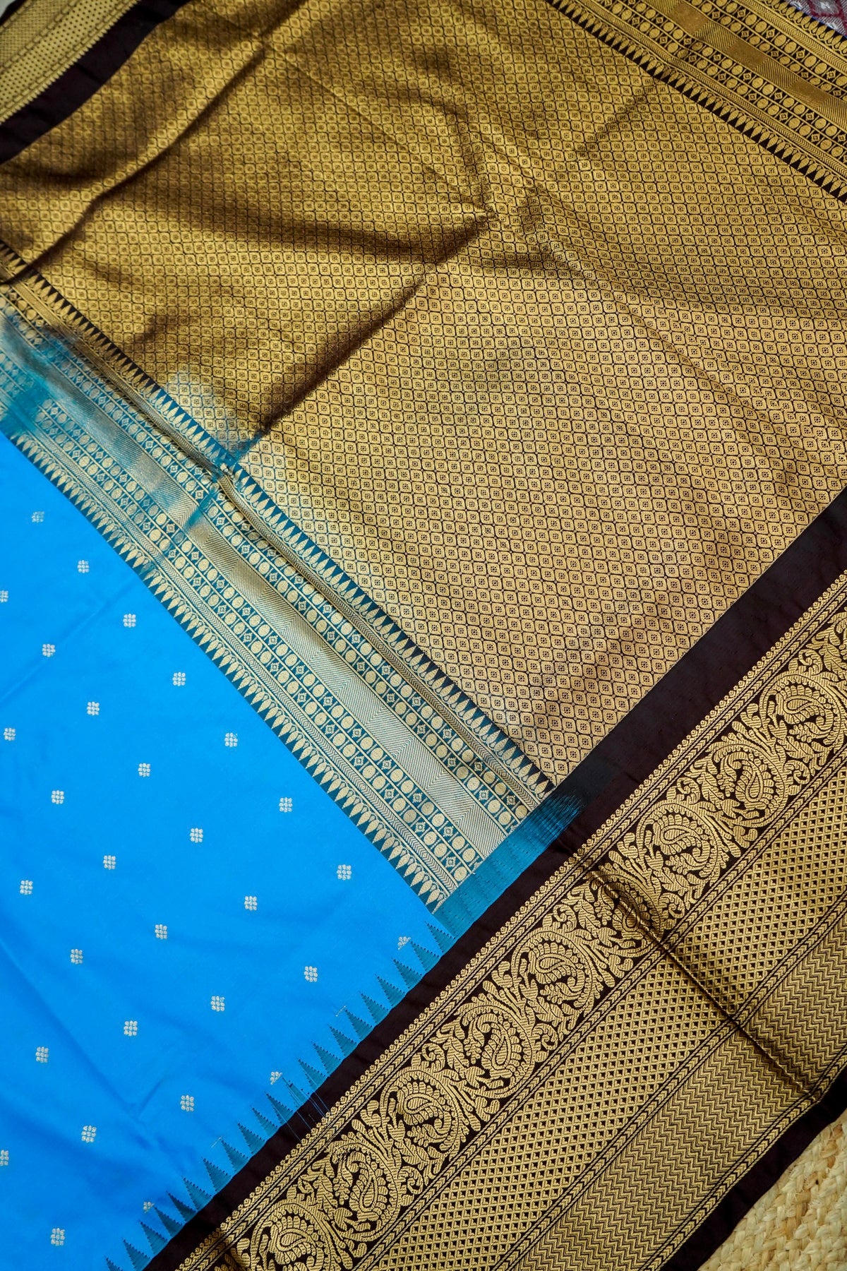 Suvarna - Bright Turquoise Blue Gadwal Silk Saree with Brown Gold Border