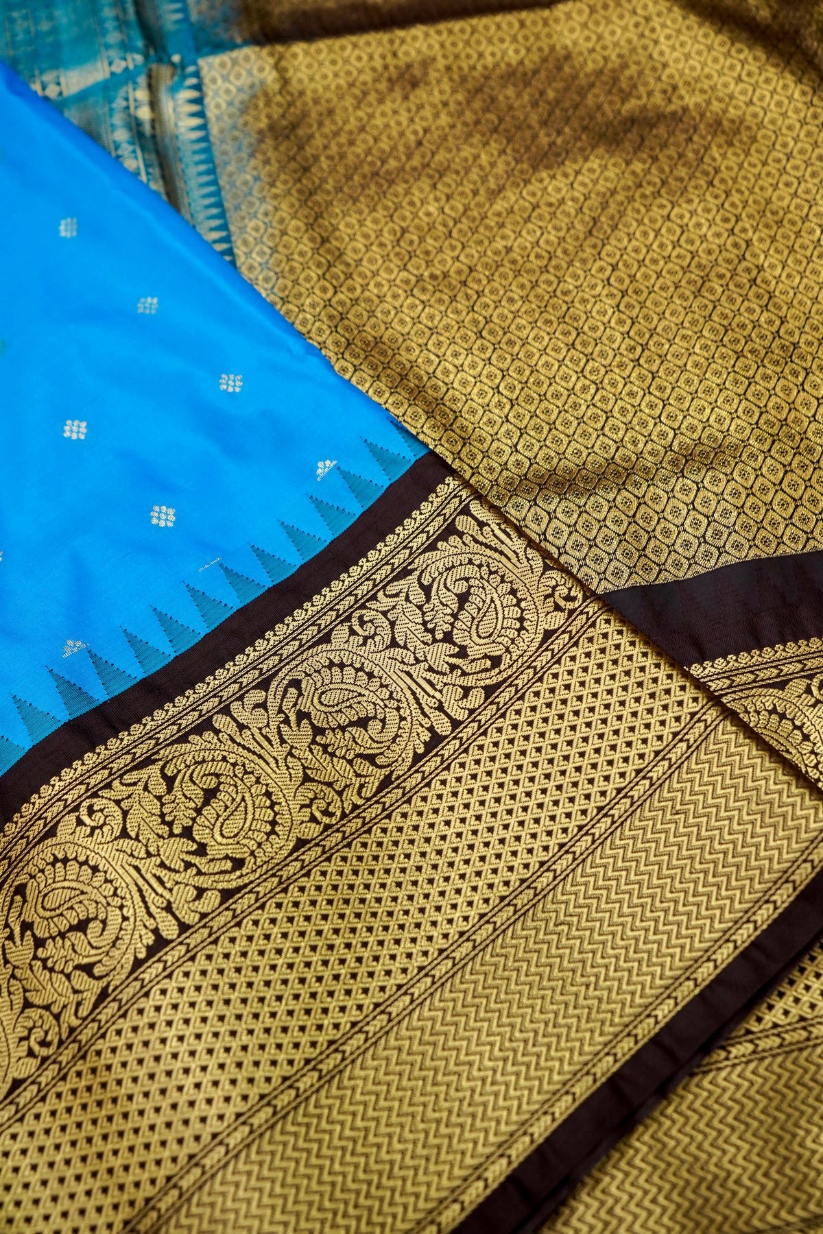 Suvarna - Bright Turquoise Blue Gadwal Silk Saree with Brown Gold Border