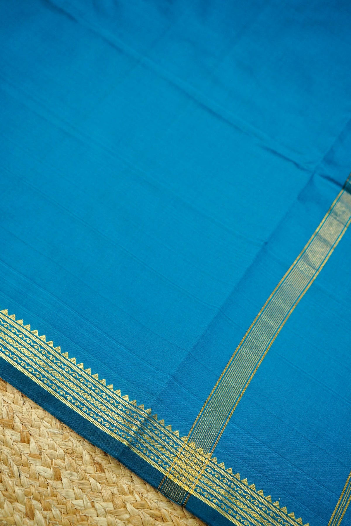 Suvarna - Peacock Blue Mysore Crepe Silk Saree with Gold Kaat Border