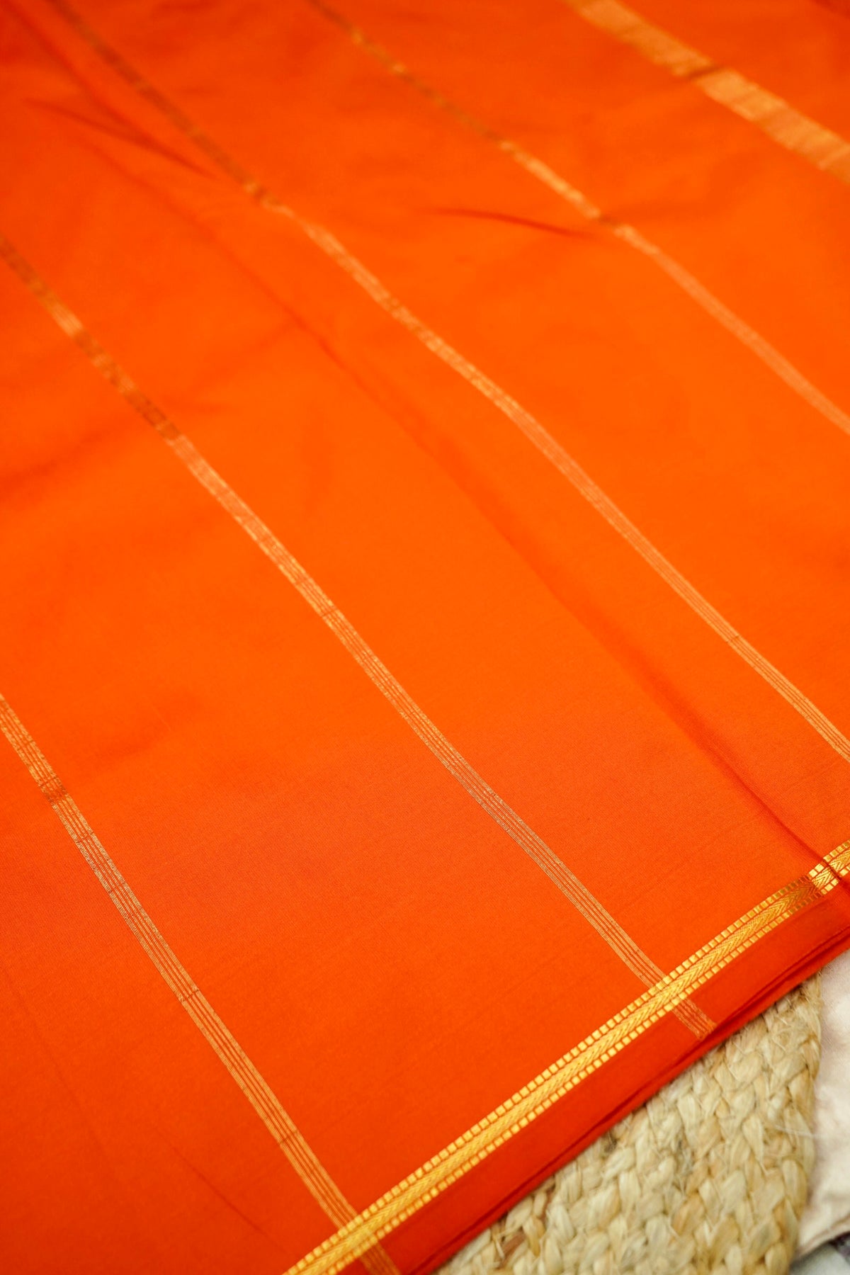 Suvarna - Vibrant Orange Mysore Crepe Silk Saree with Gold Fine Border