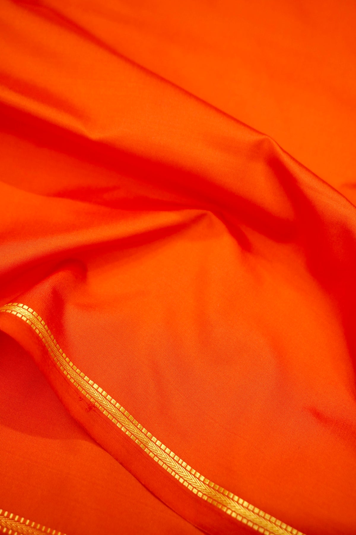 Suvarna - Vibrant Orange Mysore Crepe Silk Saree with Gold Fine Border