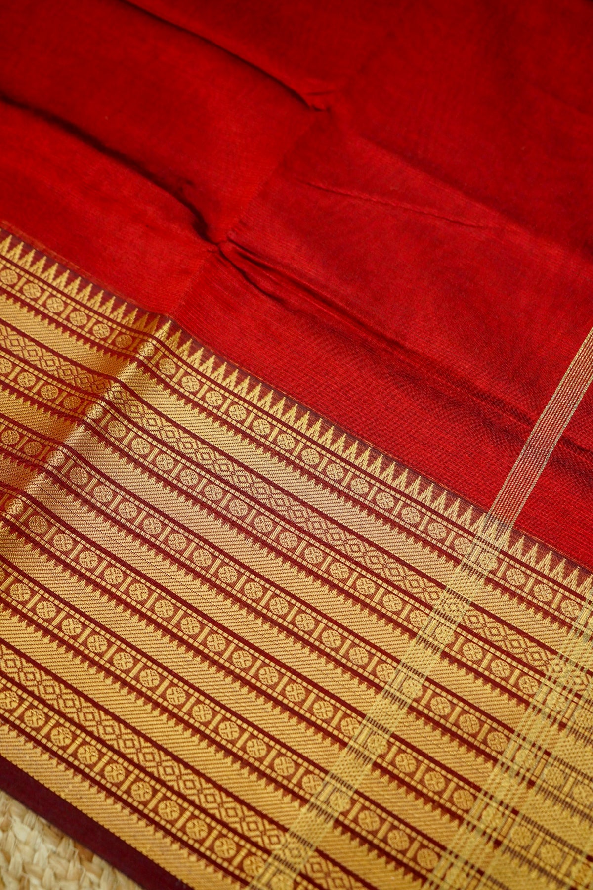 Suvarna - Ruby Red Gadwal Silk Saree with Antique Gold Zari Border