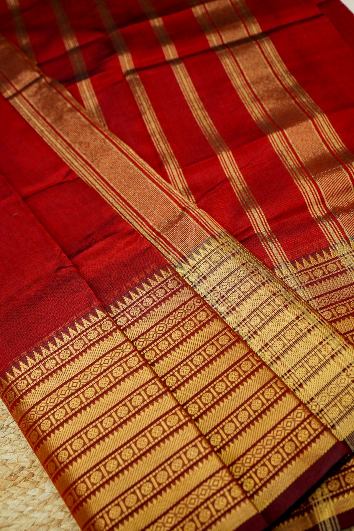 Suvarna - Ruby Red Gadwal Silk Saree with Antique Gold Zari Border