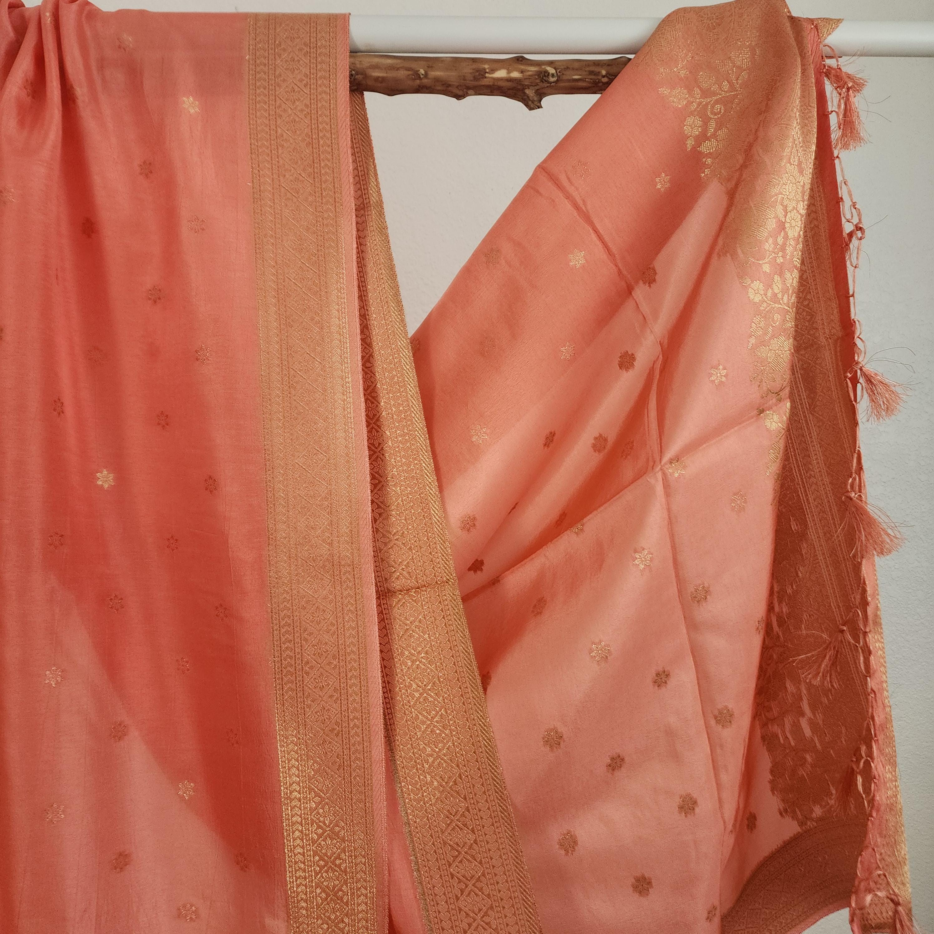 Banarasi Peach Pink Dola Silk with Golden Zari border & Floral motifs