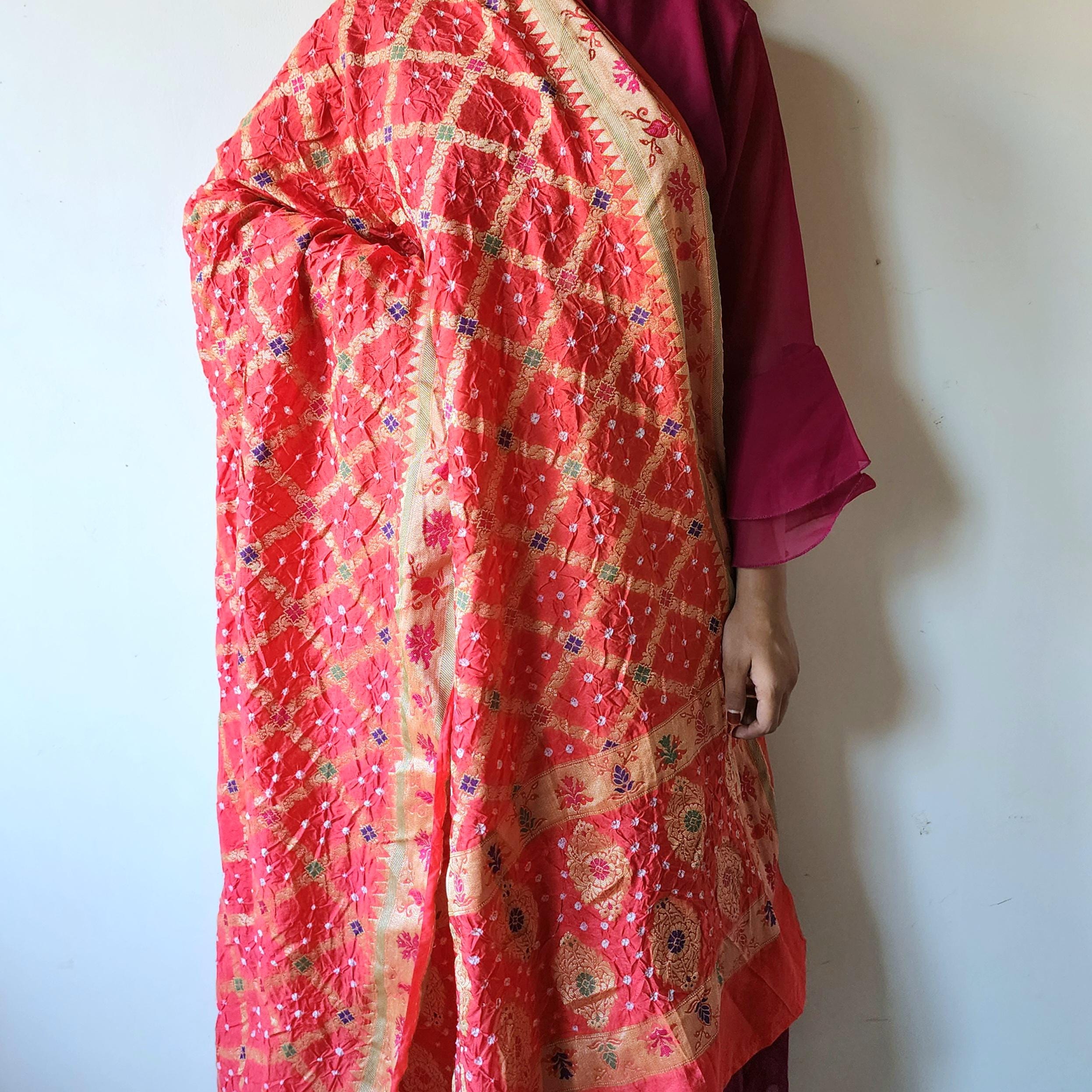 Tomato Red Bandhni Dupatta with Golden Border & Banarasi Meenakari Work