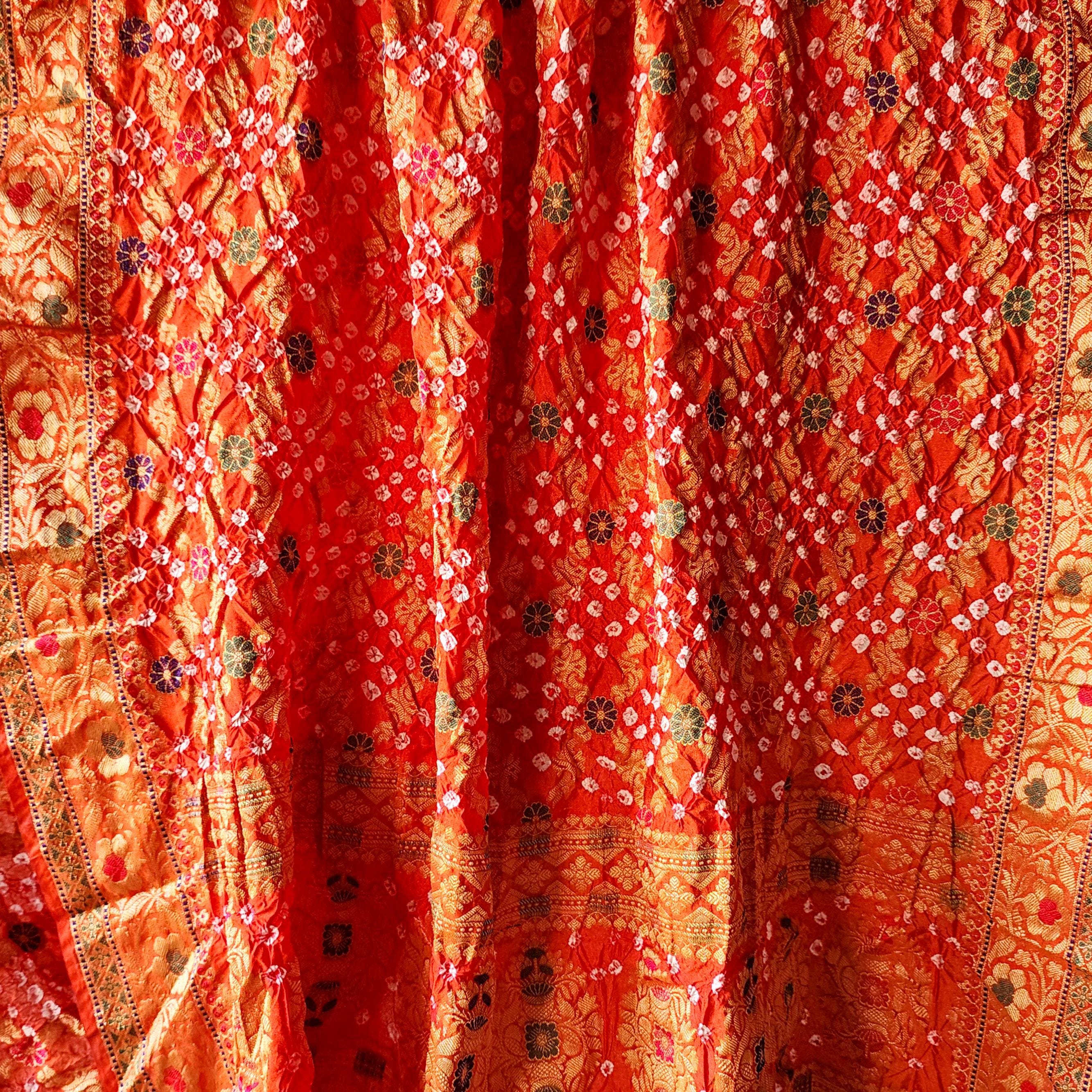 Orange Bandhni dupatta with Banarasi Meenakari work
