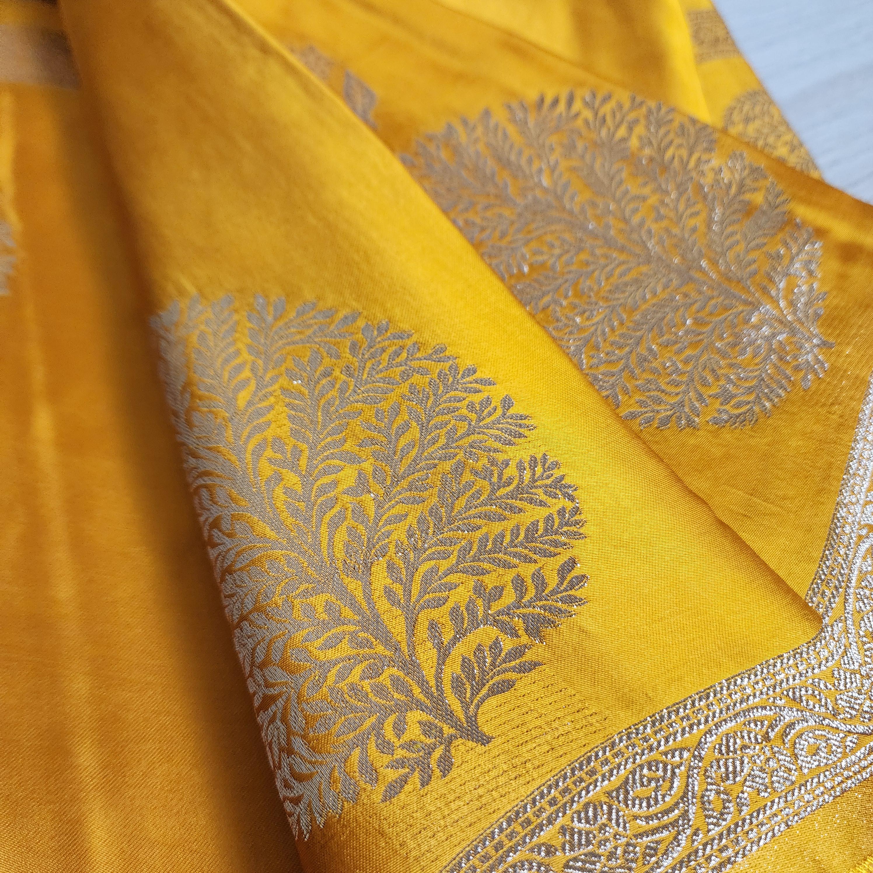 Banarasi Crape Georgette Saree in elegant yellow & light gold Zari