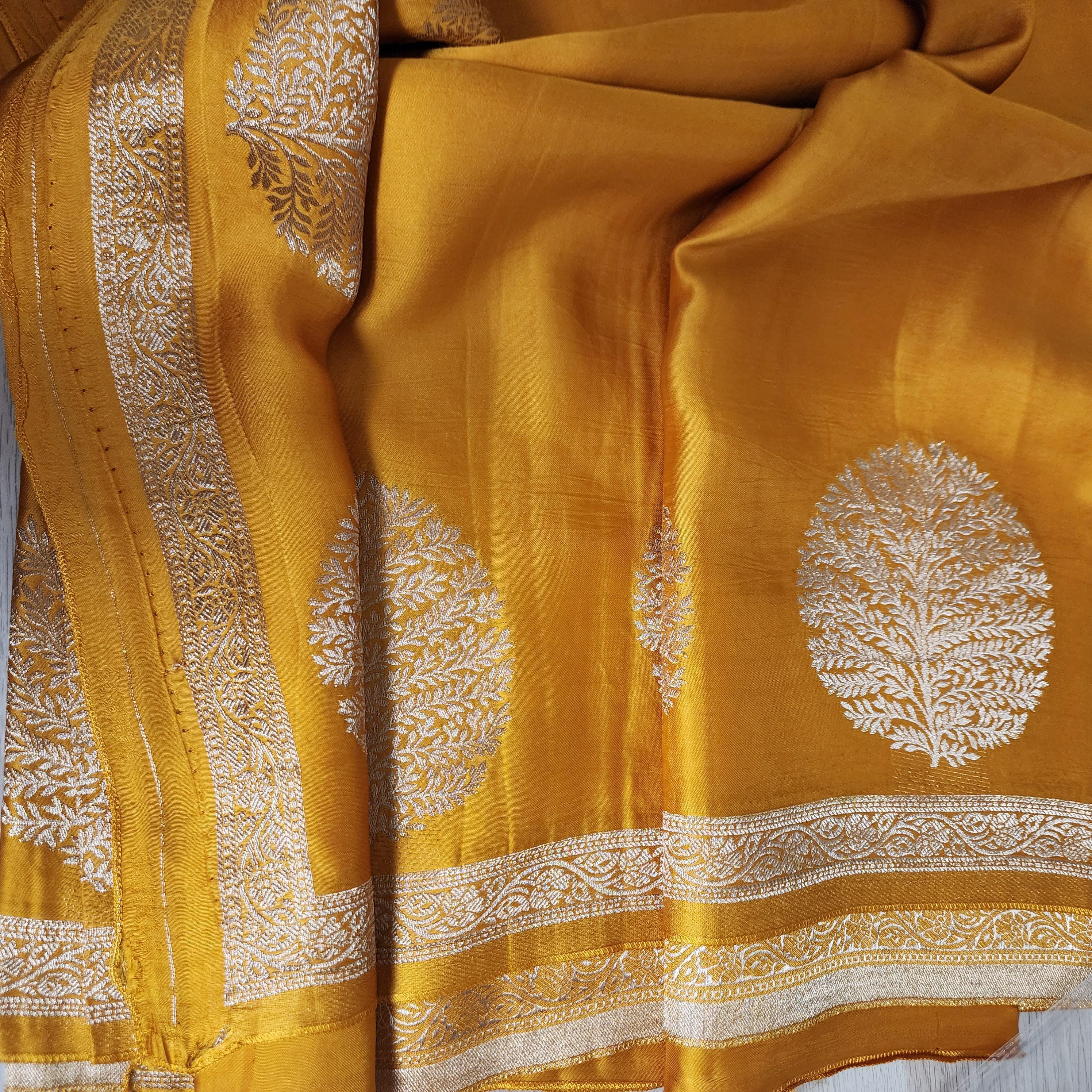 Banarasi Crape Georgette Saree in elegant yellow & light gold Zari