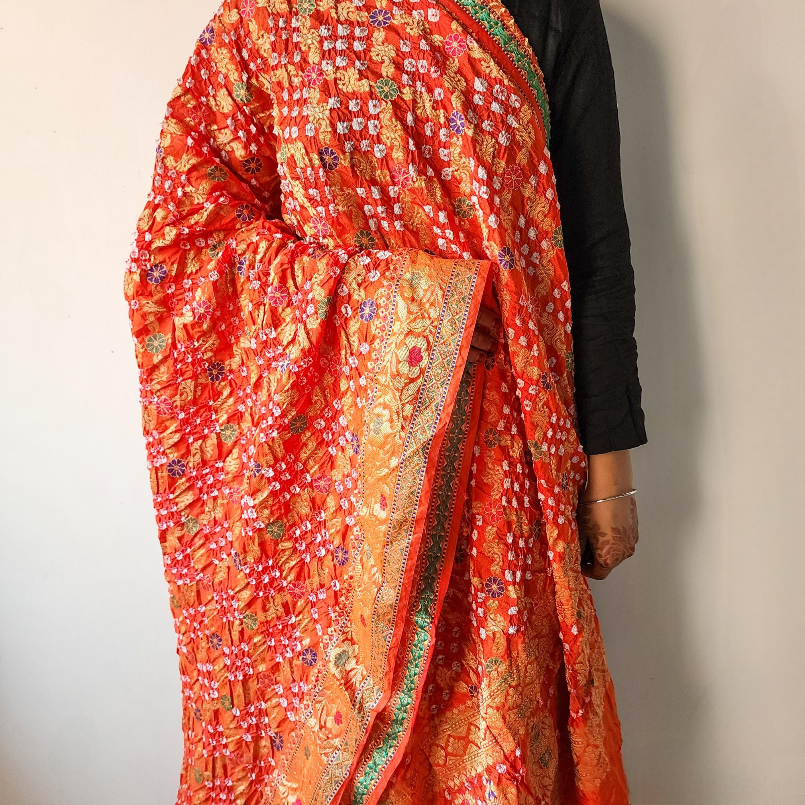 Orange Bandhni dupatta with Banarasi Meenakari work
