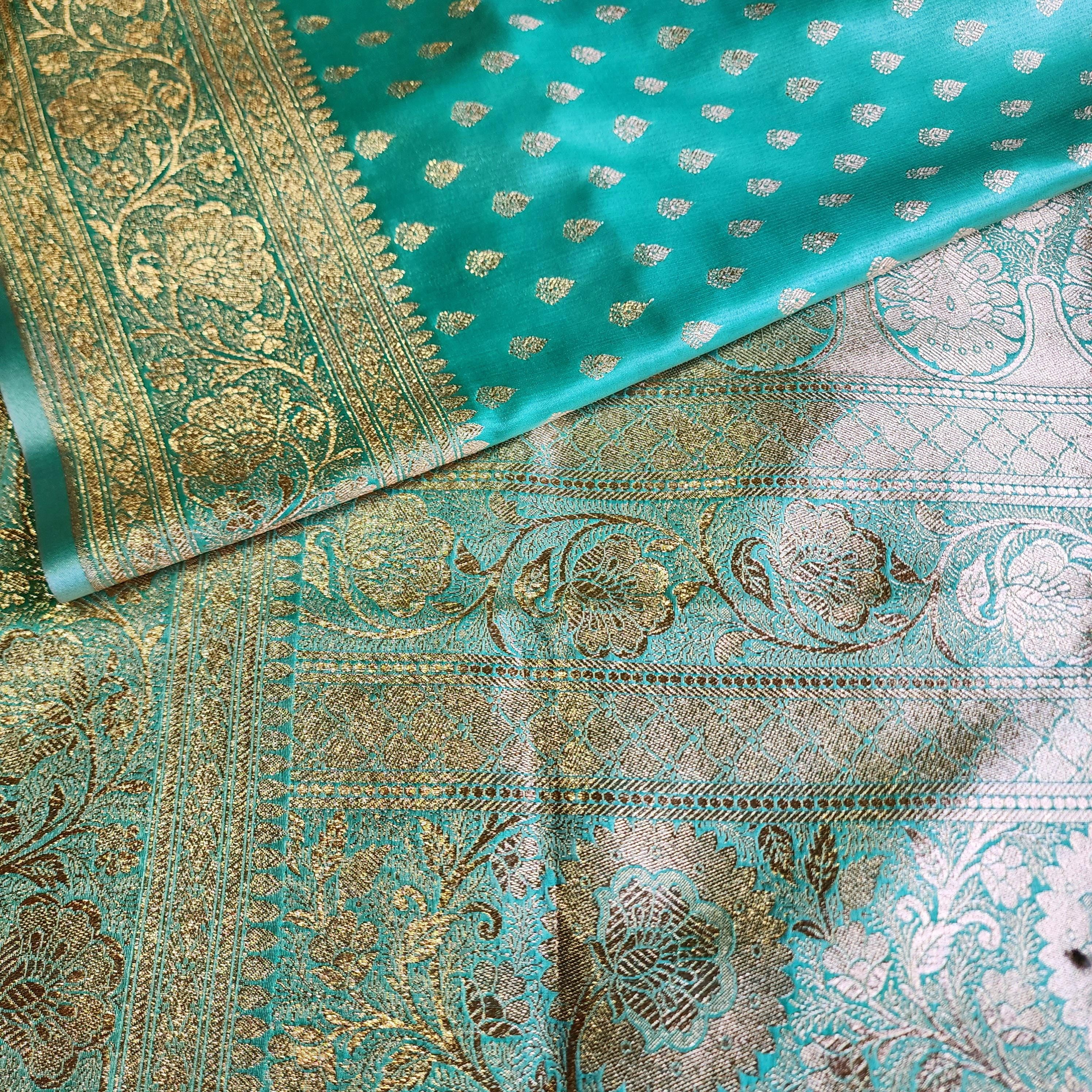 Rich Emerald Green Banarasi Silk Saree with Gold Zari Weaving