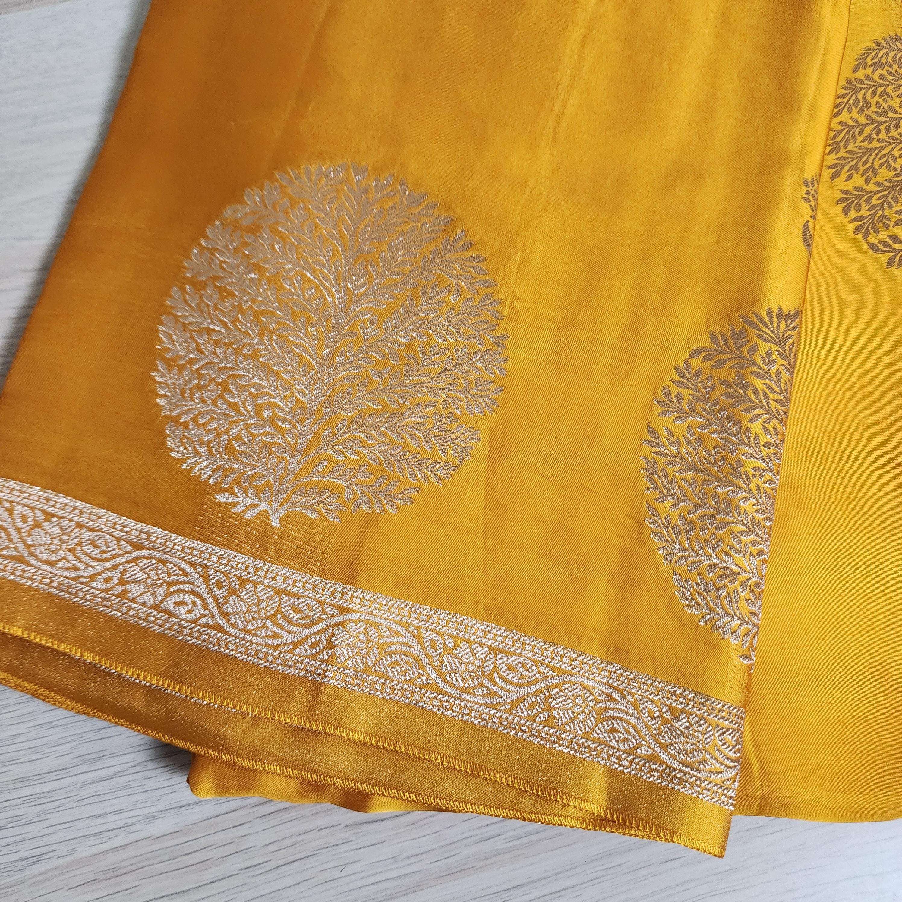Banarasi Crape Georgette Saree in elegant yellow & light gold Zari