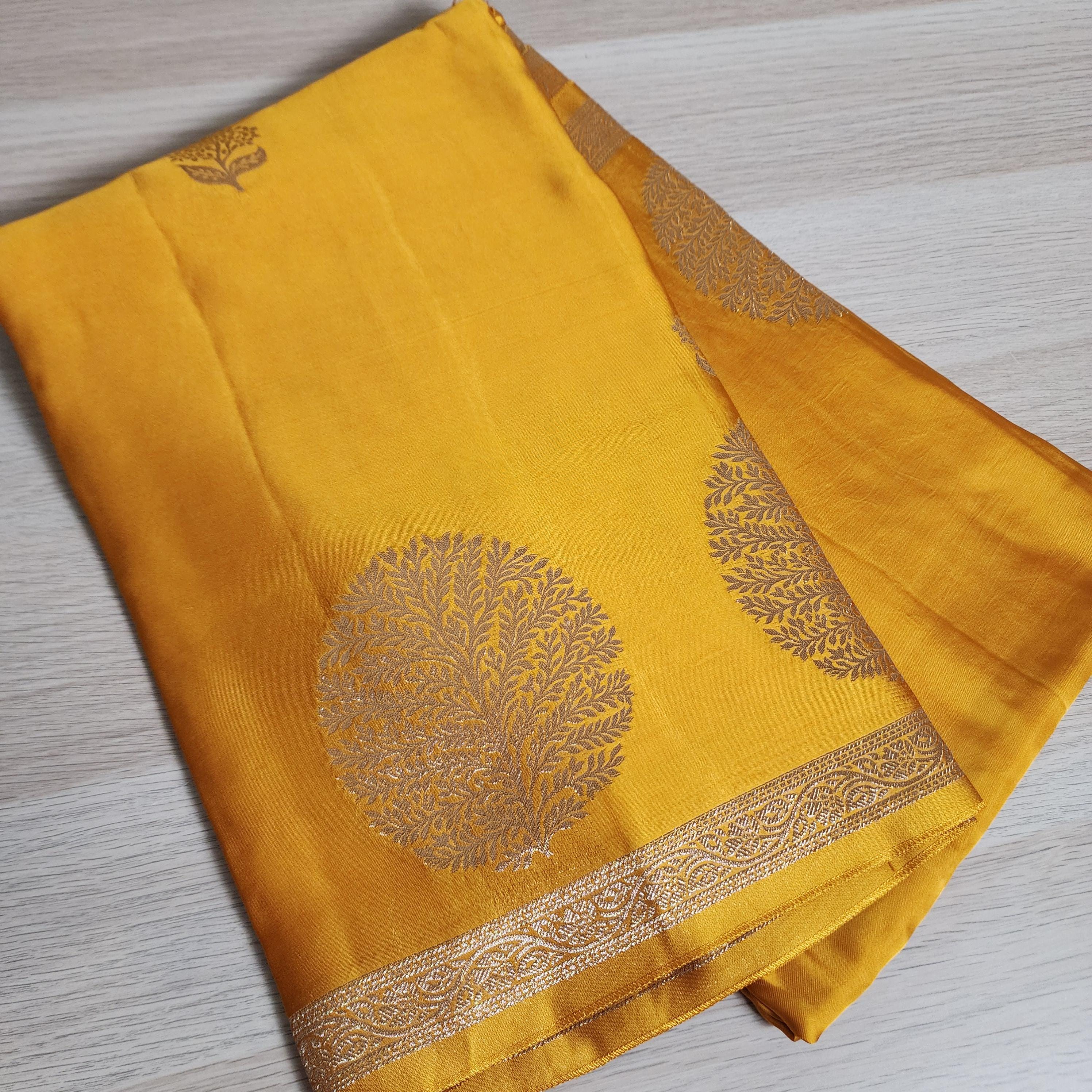 Banarasi Crape Georgette Saree in elegant yellow & light gold Zari