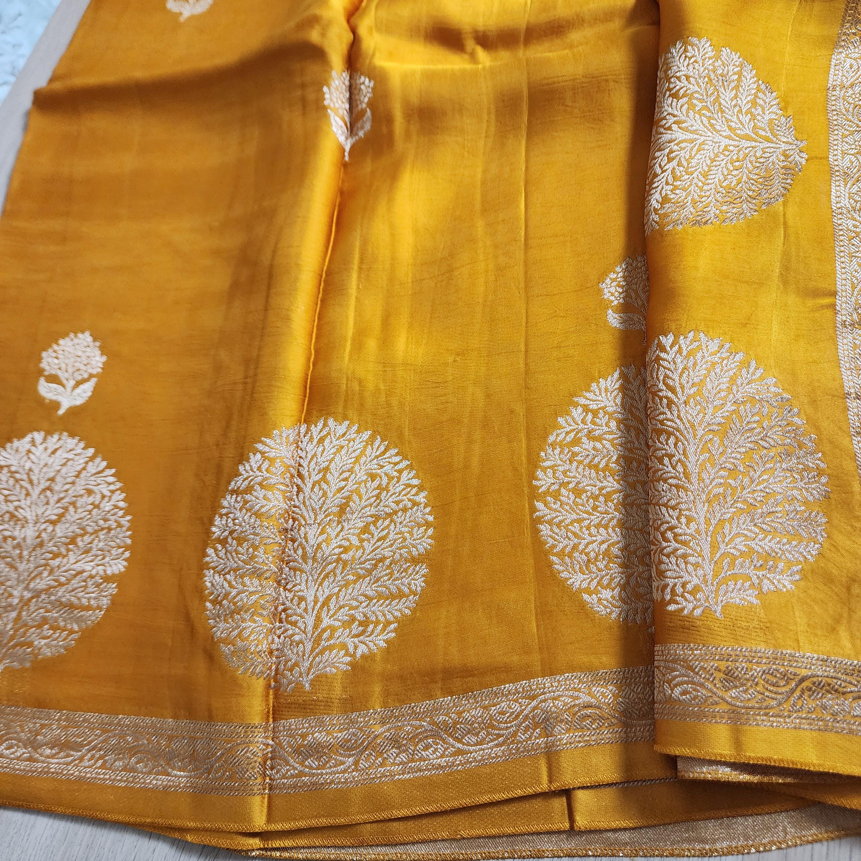 Banarasi Crape Georgette Saree in elegant yellow & light gold Zari
